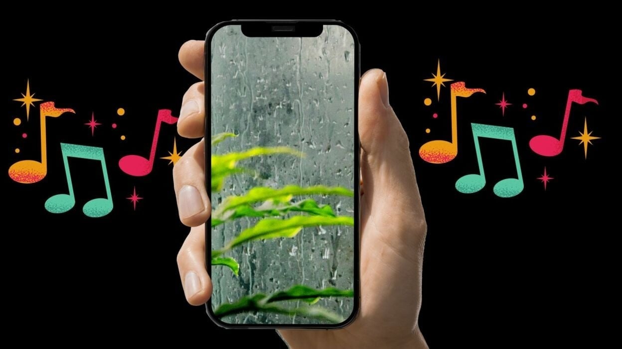 iPhone showing rain on the screen with music notes in the background