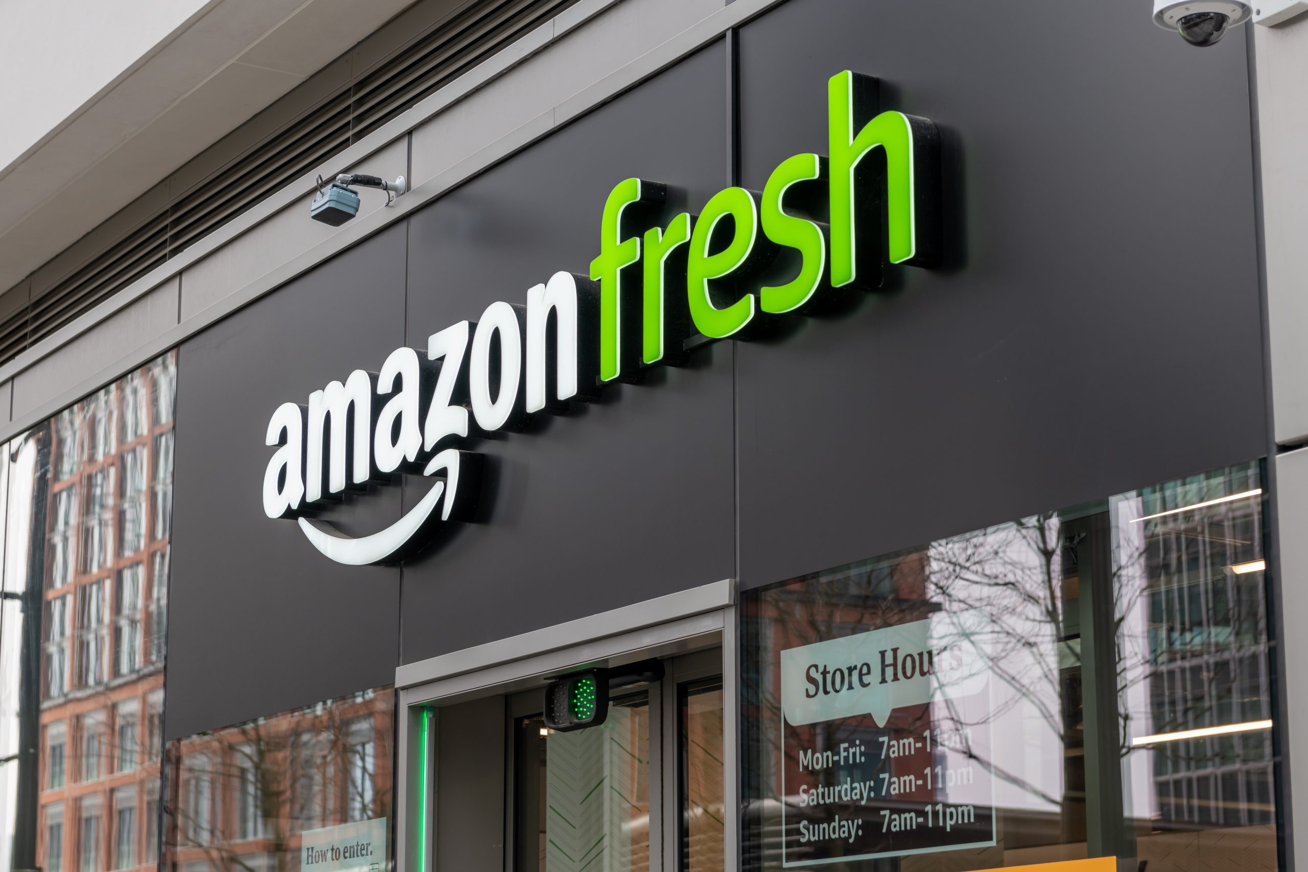  The name sign and frontage of the branch of Amazon Fresh grocery store in Canary Wharf.