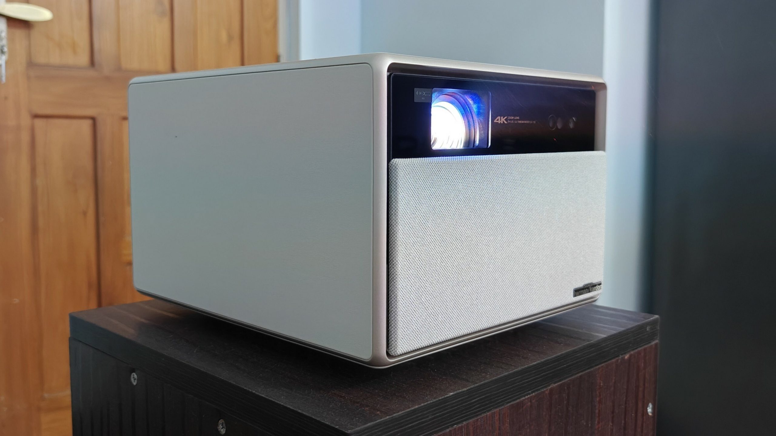 XGIMI Horizon Ultra projector on a wooden stand