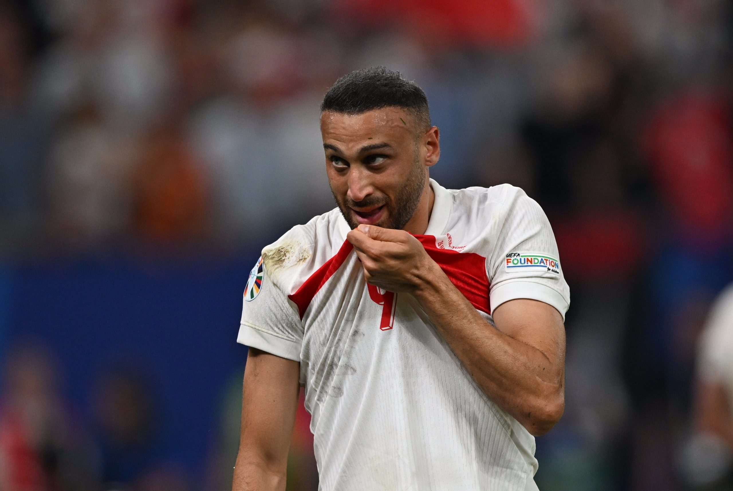 Cenk Tosun of Turkiye celebrates