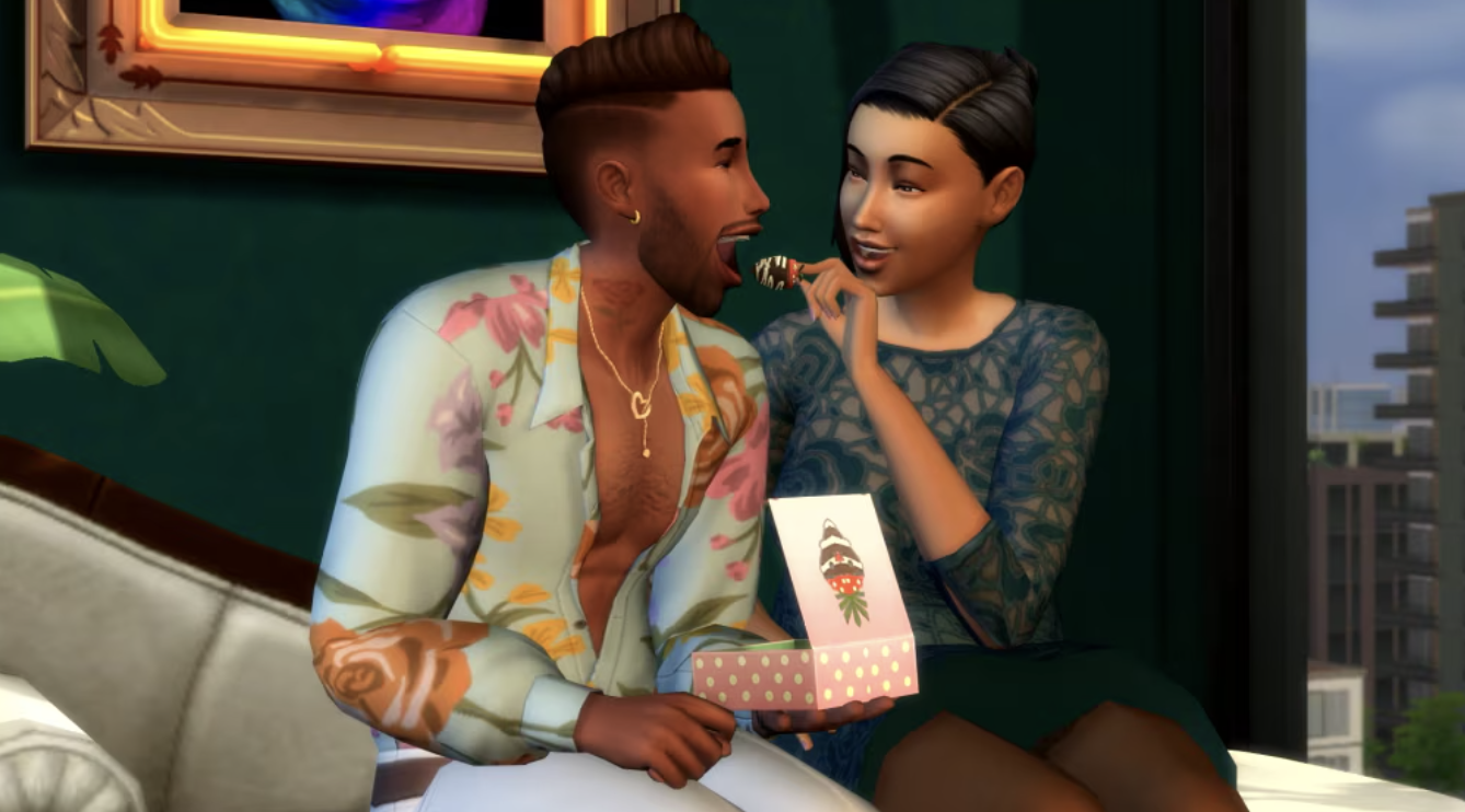 one sim romantically feeding a strawberry to another