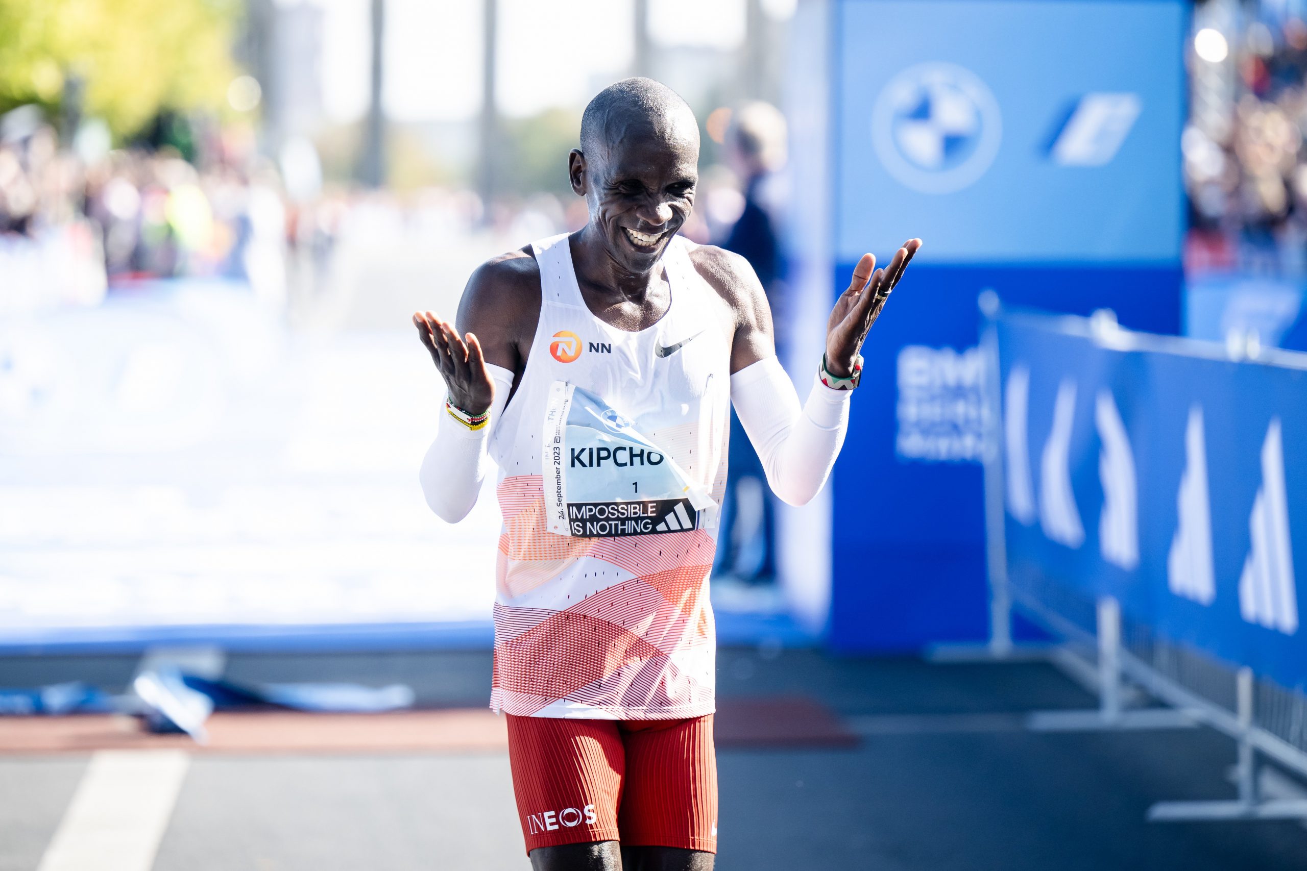 Eliud Kipchoge celebrates as first male finisher during the 2023 BMW Berlin-Marathon 