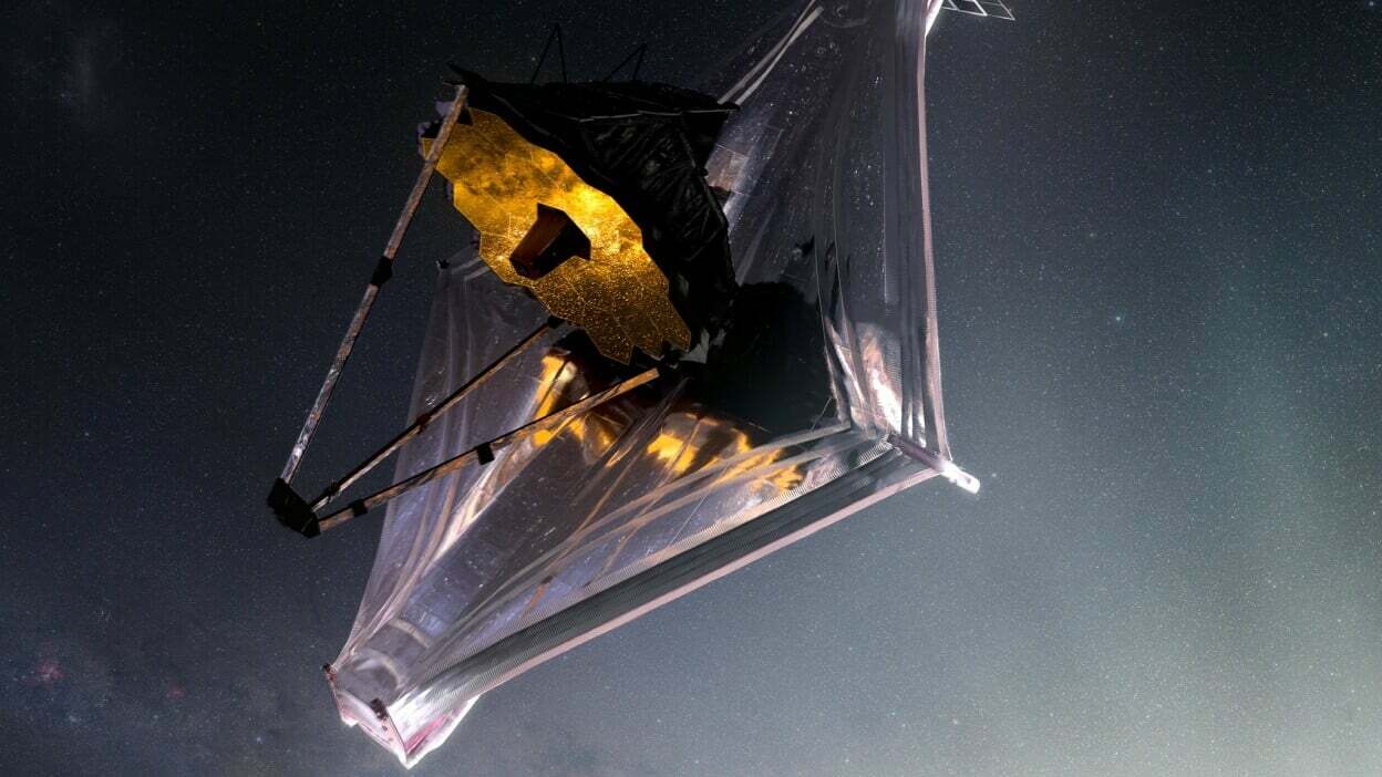 An illustration of the James Webb Space Telescope as it orbits the sun in our solar system, 1 million miles from Earth.