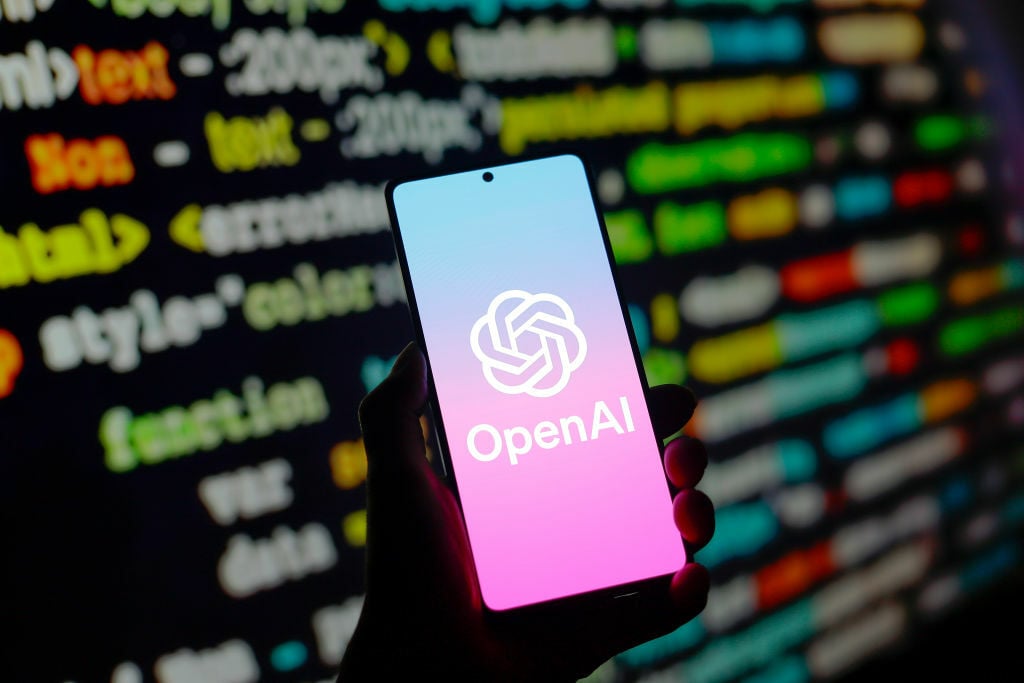 OpenAI logo on phone screen