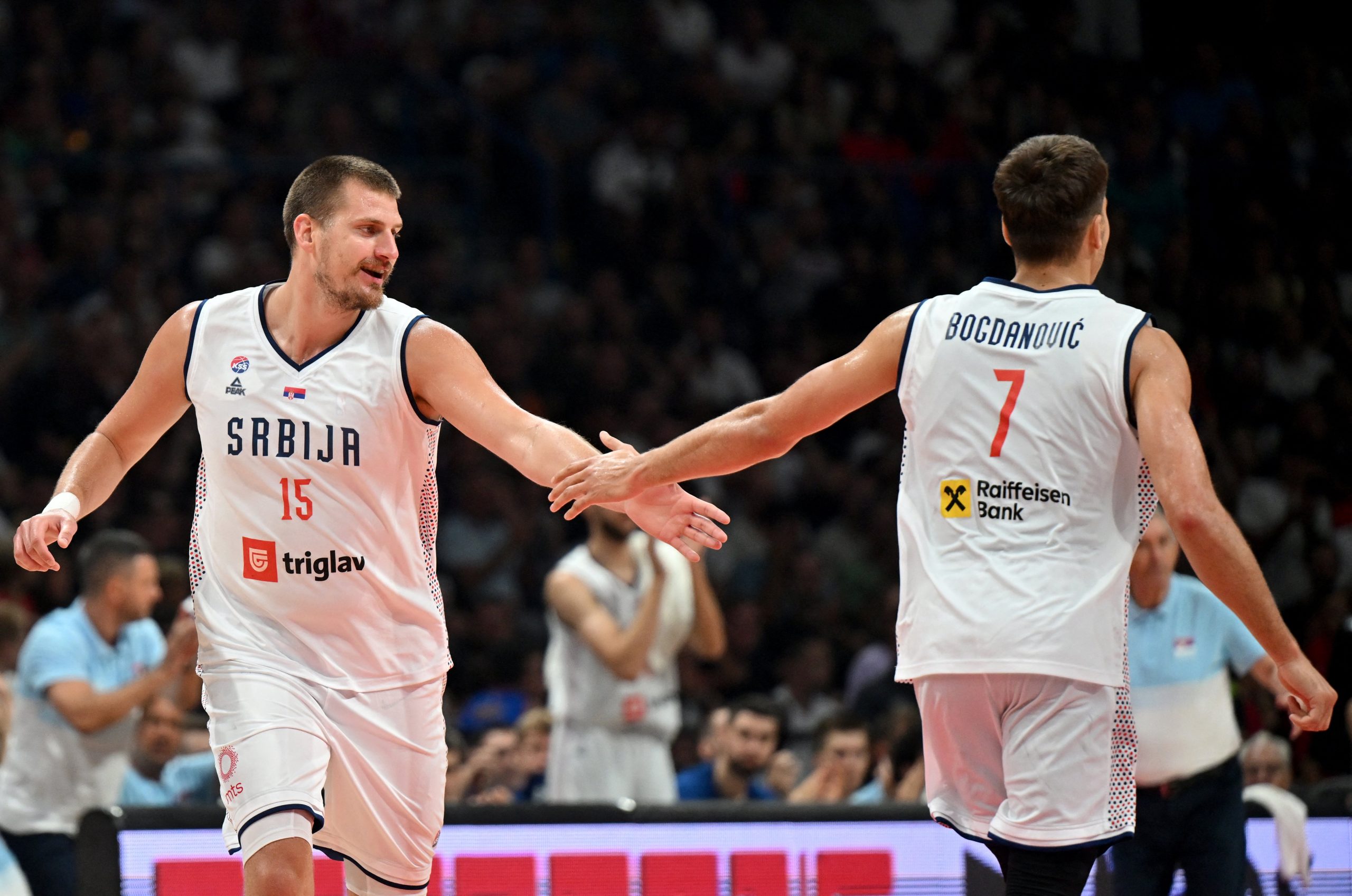 Serbia's Nikola Jokic and teammate Bogdan Bogdanovic