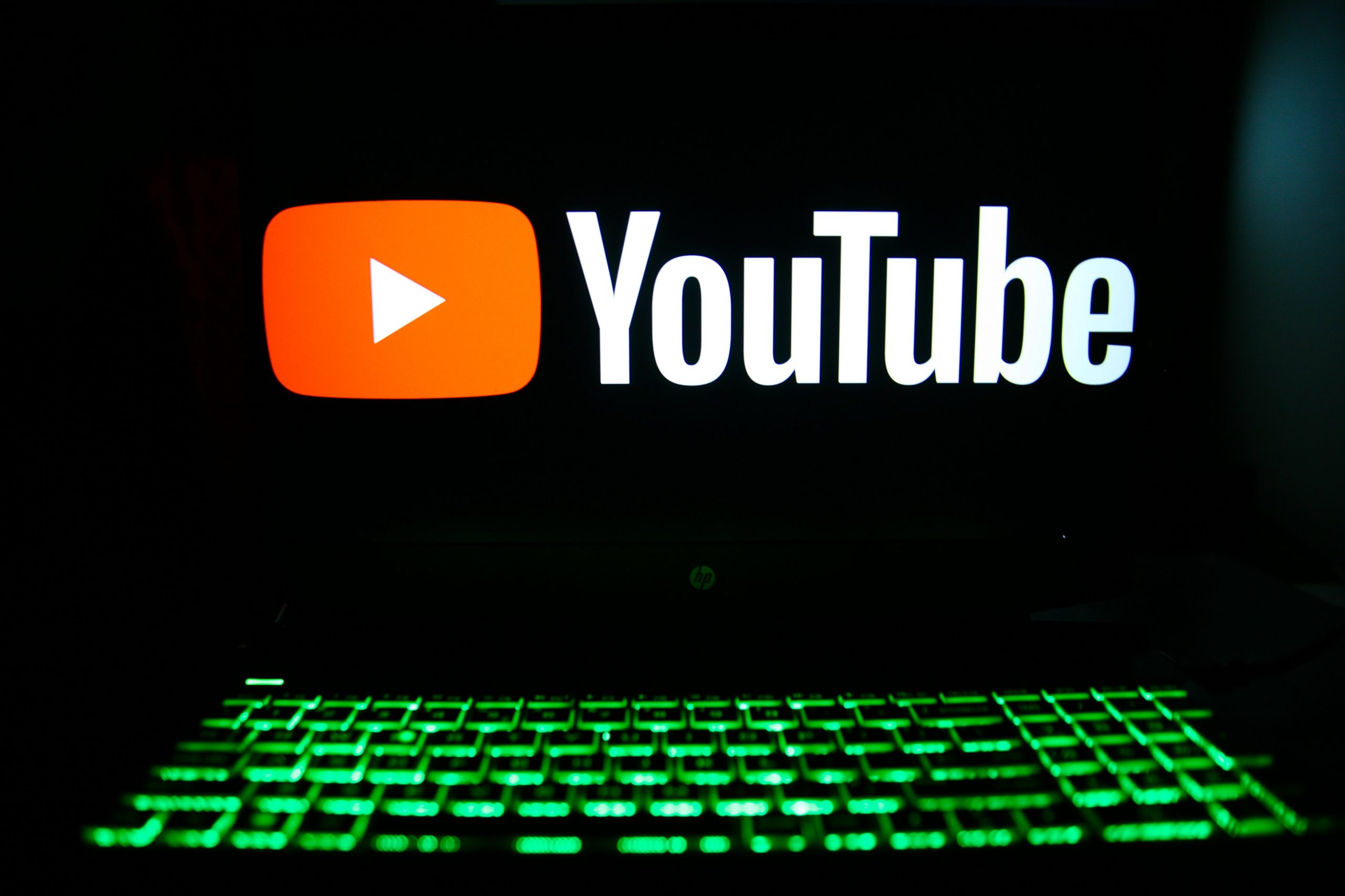 YouTube logo on laptop screen