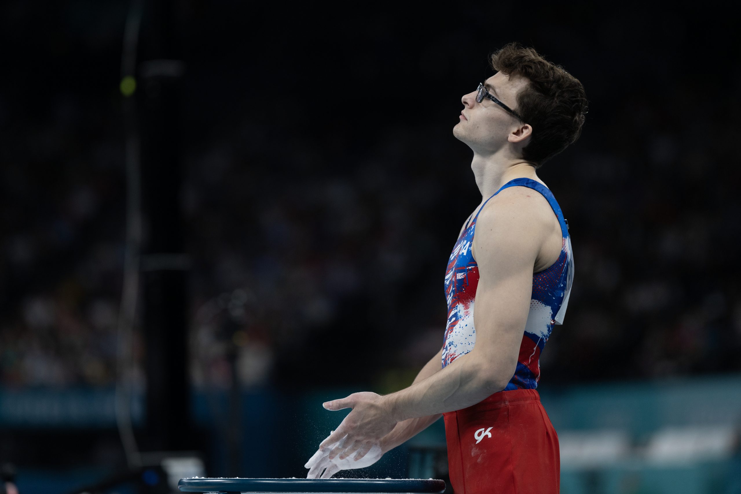 American gymnast Stephen Nedoroscik chalking up before the pommel horse event. 