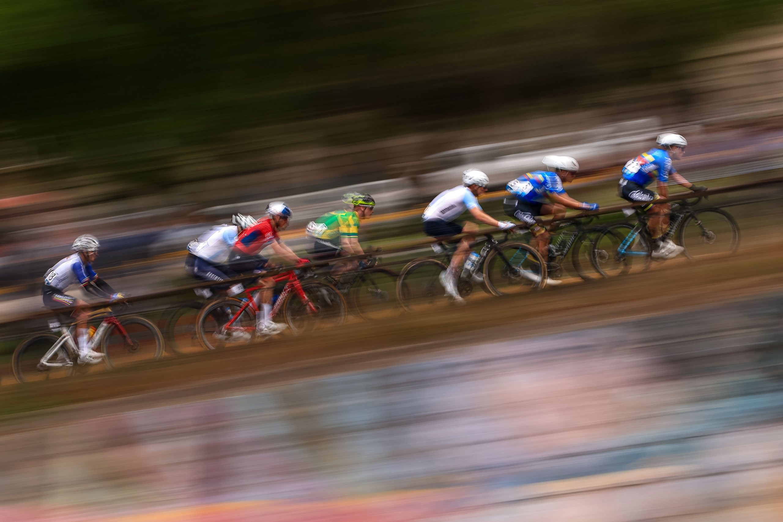 Cyclists compete in the Men's cycling road race final