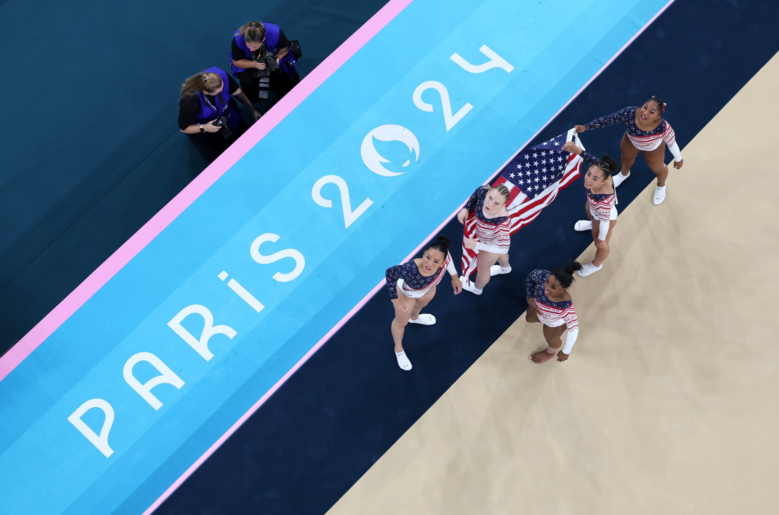 Sunisa Lee, Jade Carey, Simone Biles, Hezly Rivera and Jordan Chiles of Team Untied States celebrate winning the gold medals after the Artistic Gymnastics Women's Team Final 