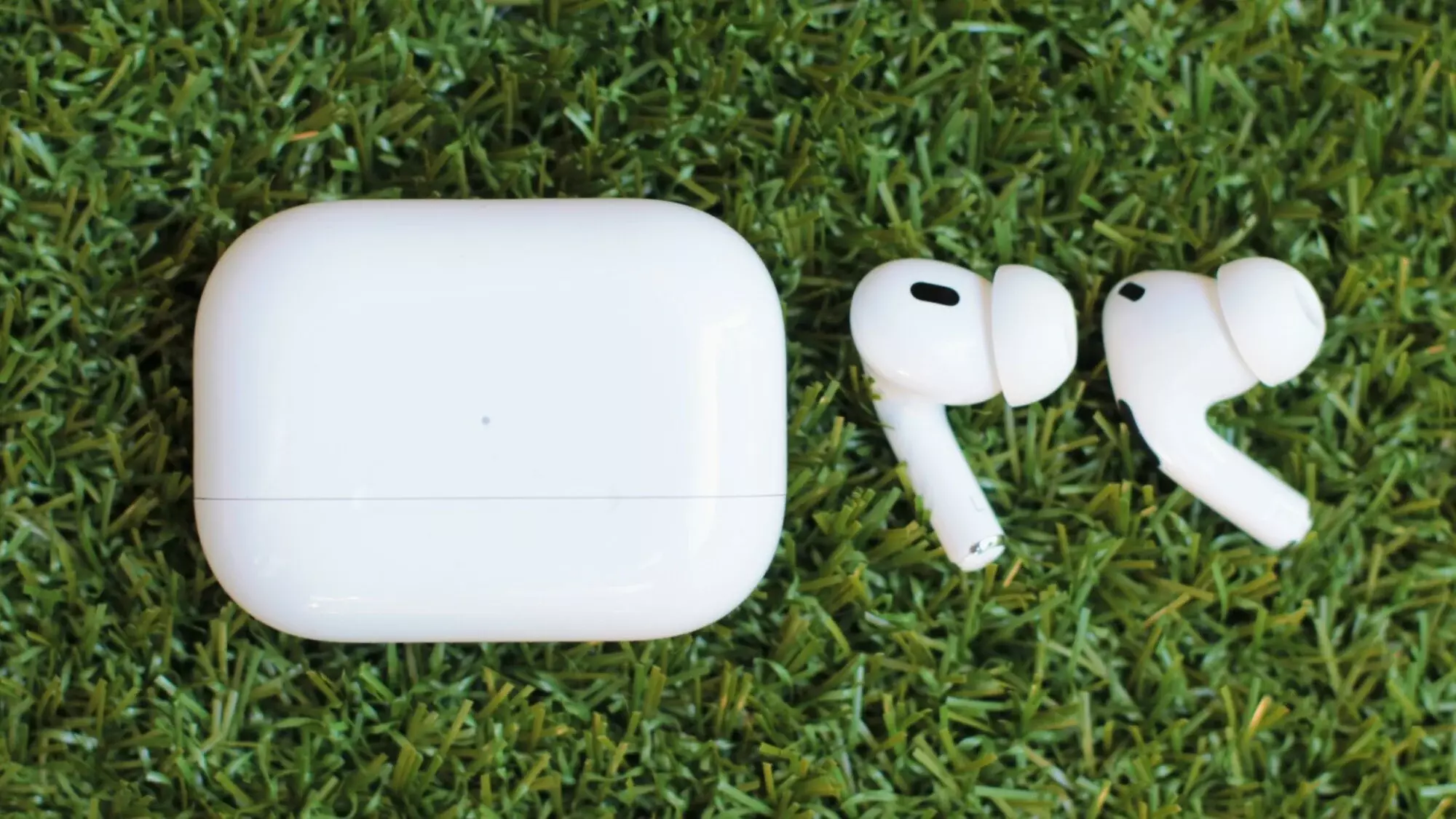 Apple AirPods Pro on green grass