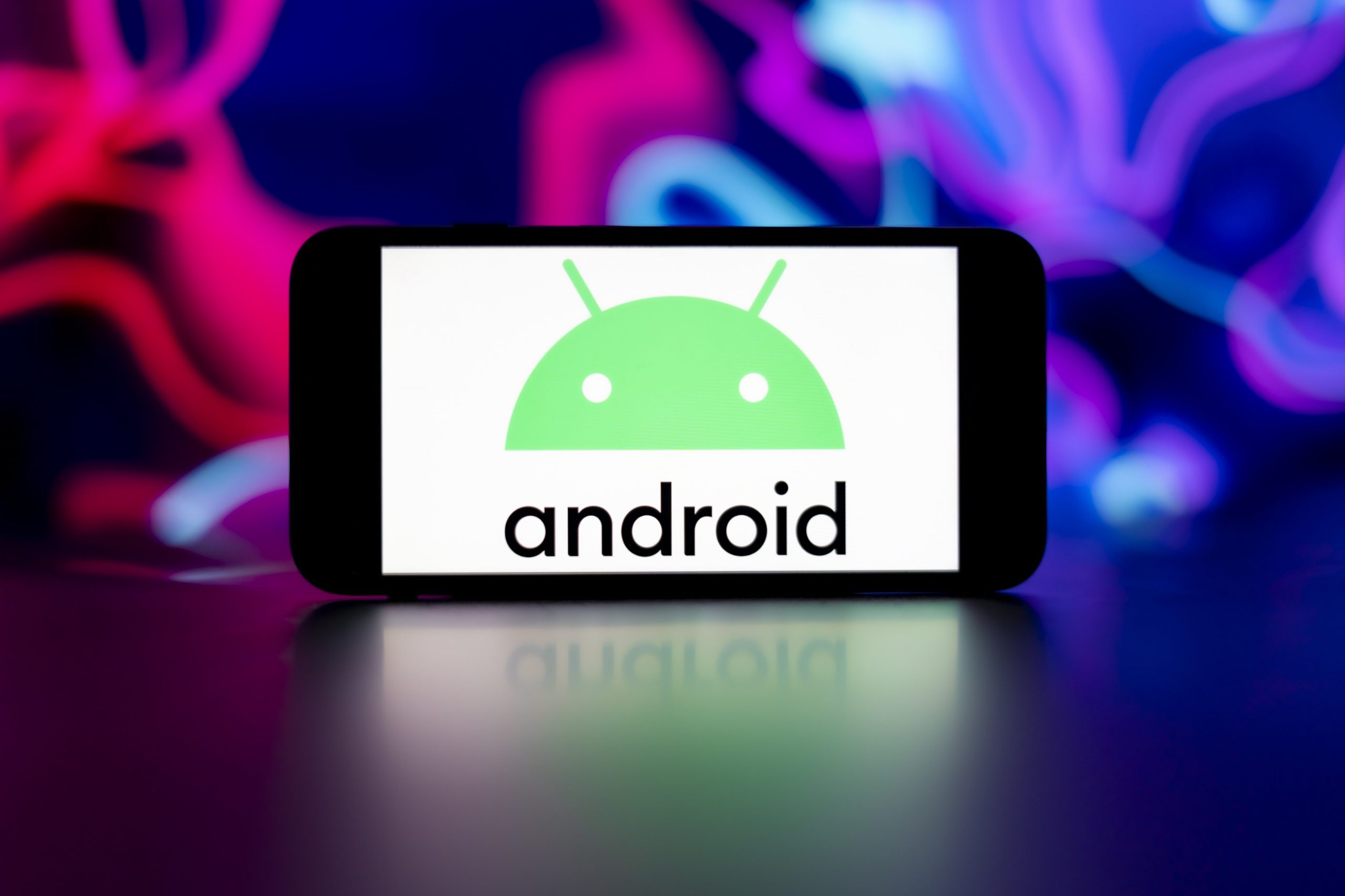 Android logo on smartphone