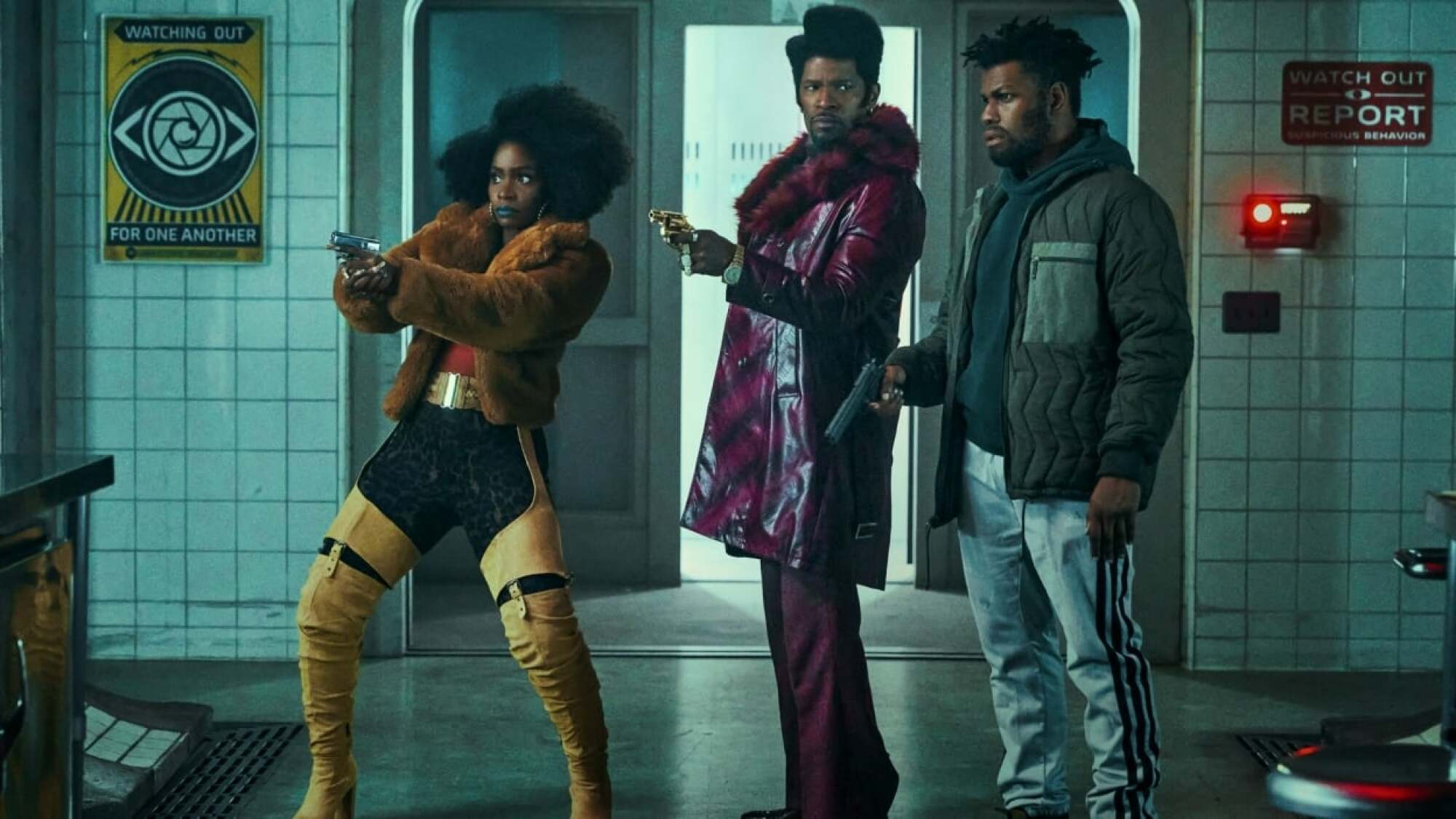 John Boyega, Jamie Foxx, and Teyonah Parris have weapons ready.