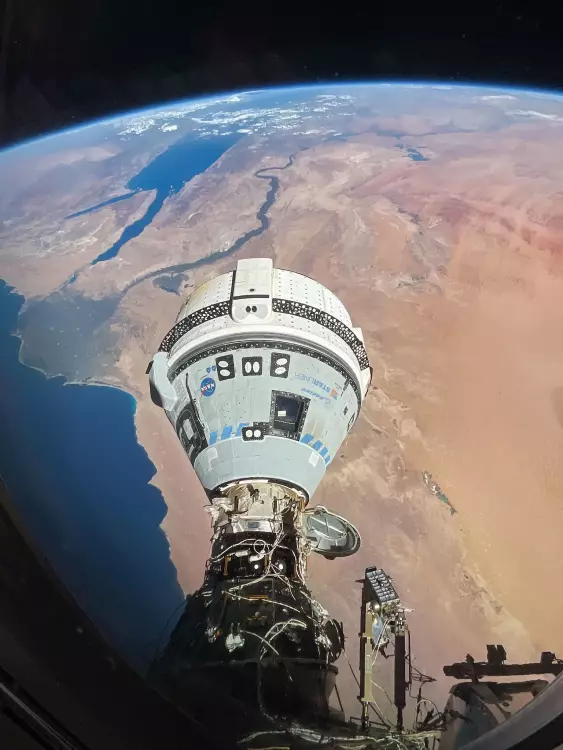 Starliner docking at the International Space Station