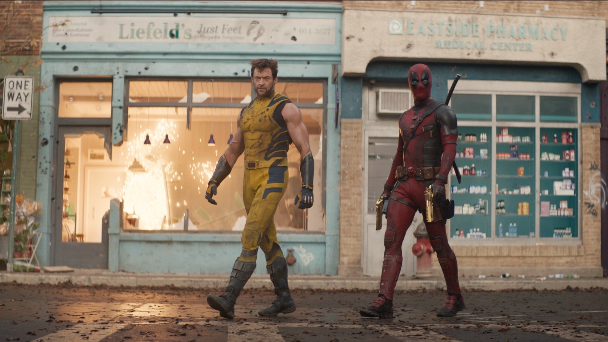 Hugh Jackman as Wolverine/Logan, Dogpool, and Ryan Reynolds as Deadpool/Wade Wilson in "Deadpool and Wolverine." 