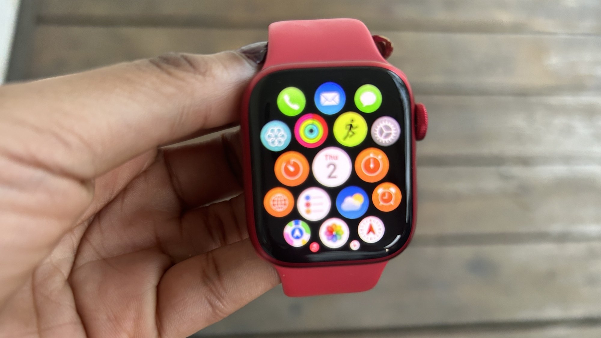 Woman holding Apple Watch Series 9