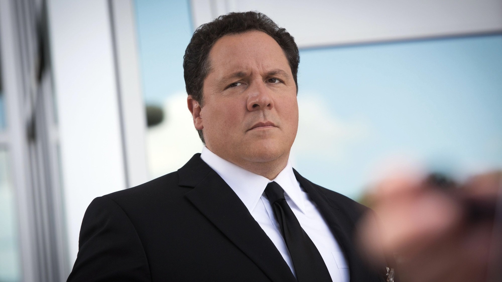 Happy Hogan in a suit.