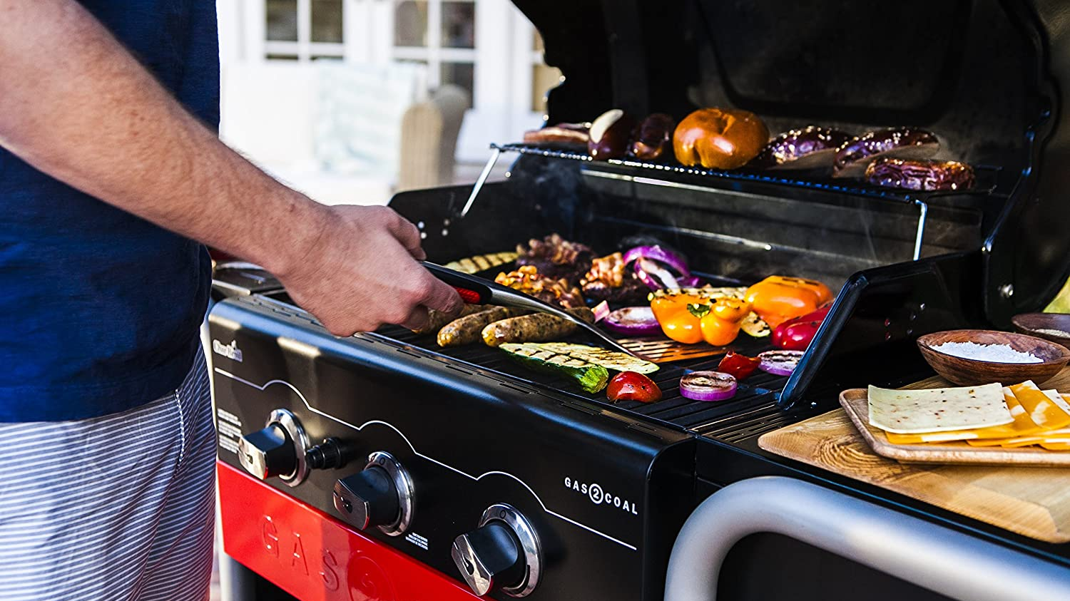 person grilling outside