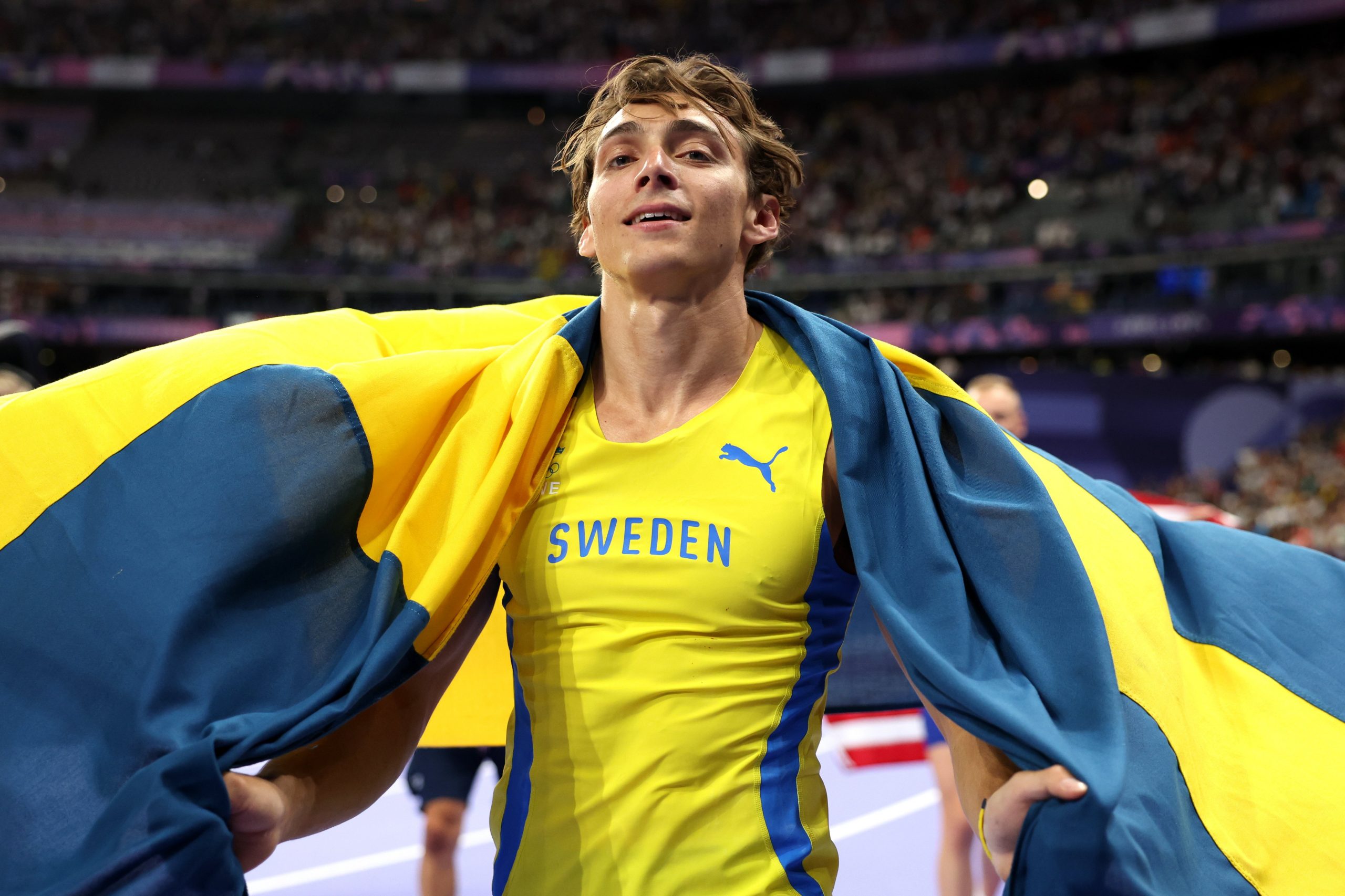 Armond 'Mondo' Duplantis poses with the Swedish flag. 