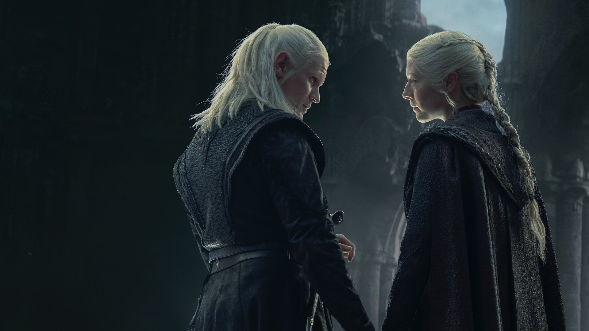 Daemon and Rhaenyra Targaryen hold hands in Harrenhal.