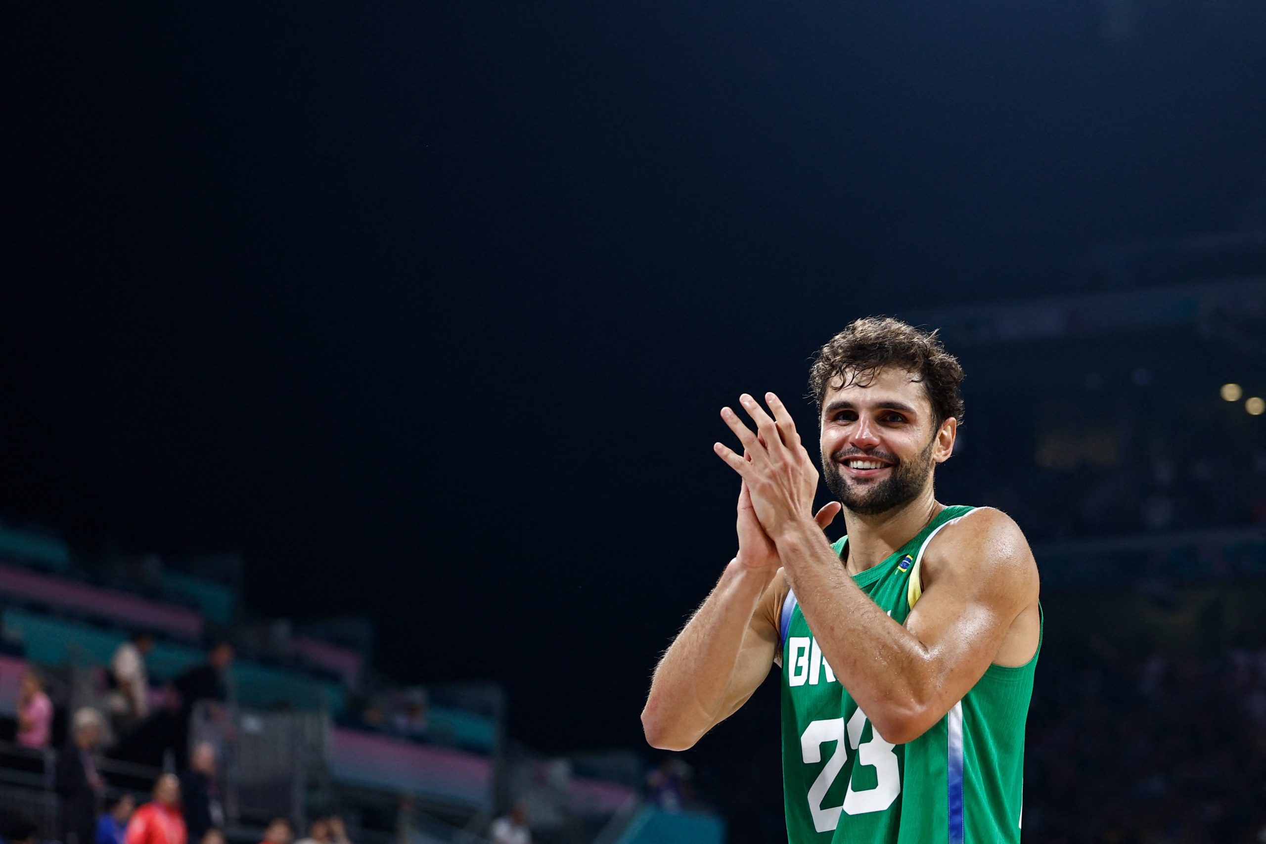 Brazil's Raul Neto applauds