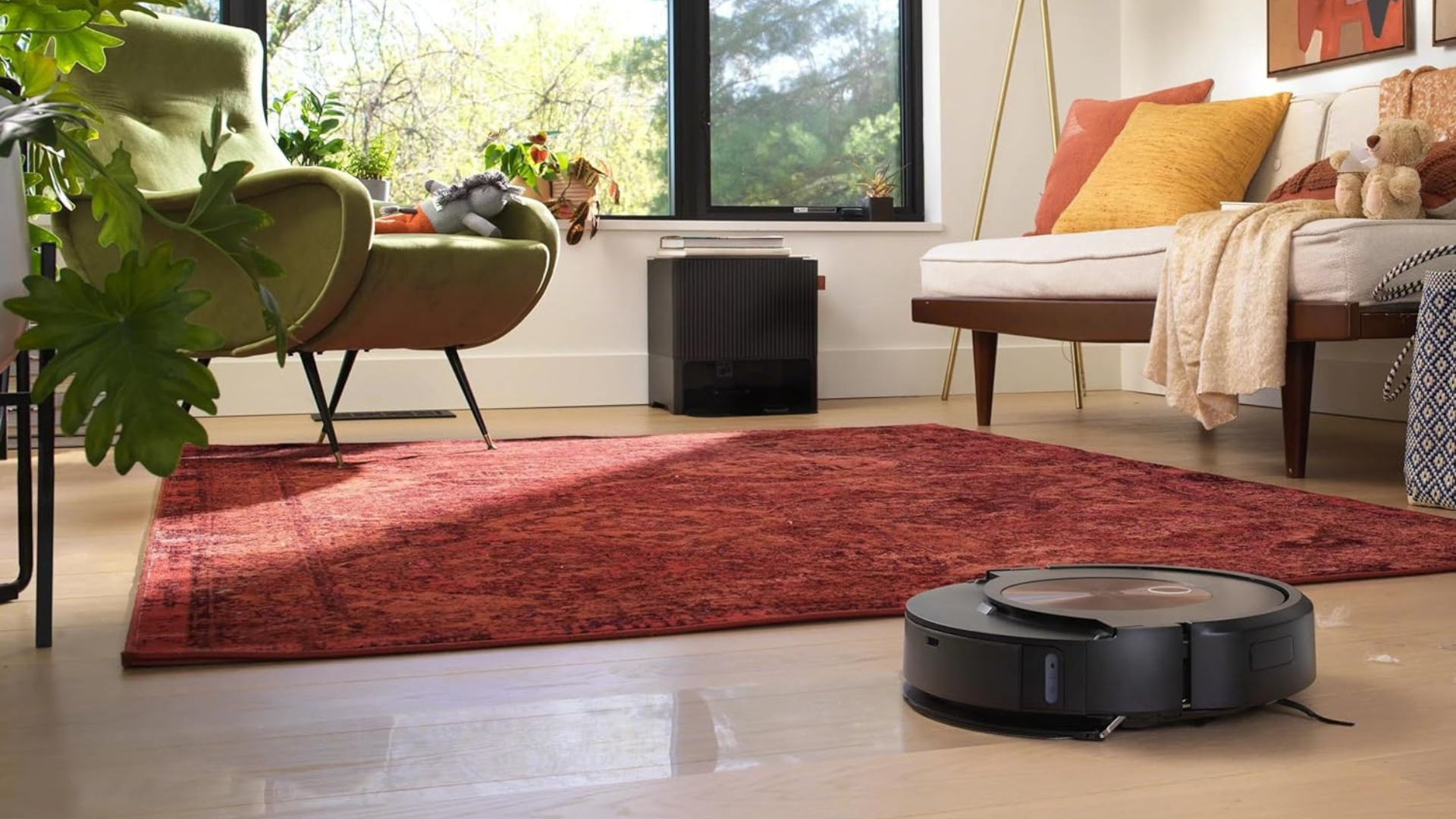 An iRobot Roomba on a living room floor.