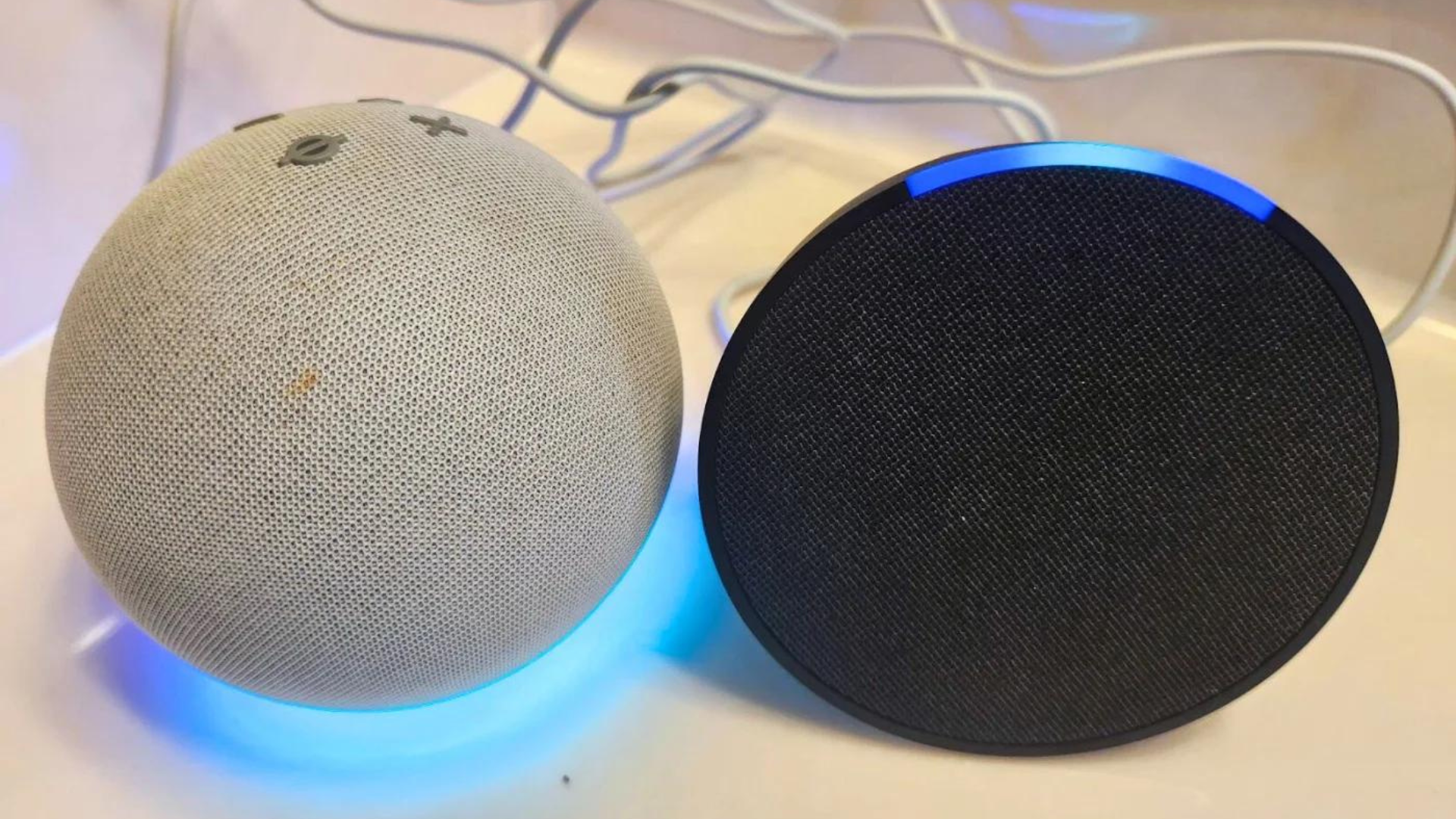 On the left, Echo Dot and on the right, an Echo Pop.