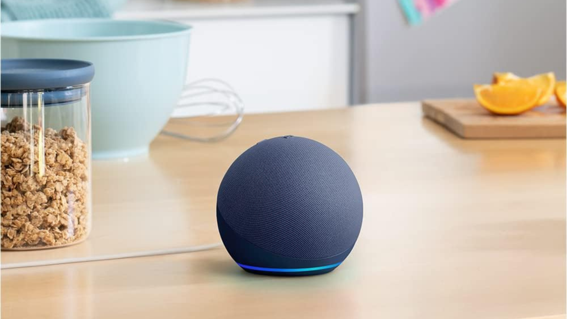 An Amazon Echo Dot on a kitchen counter