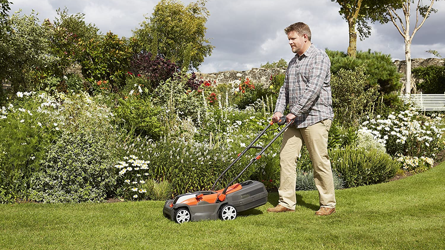 Person using a lawn mower