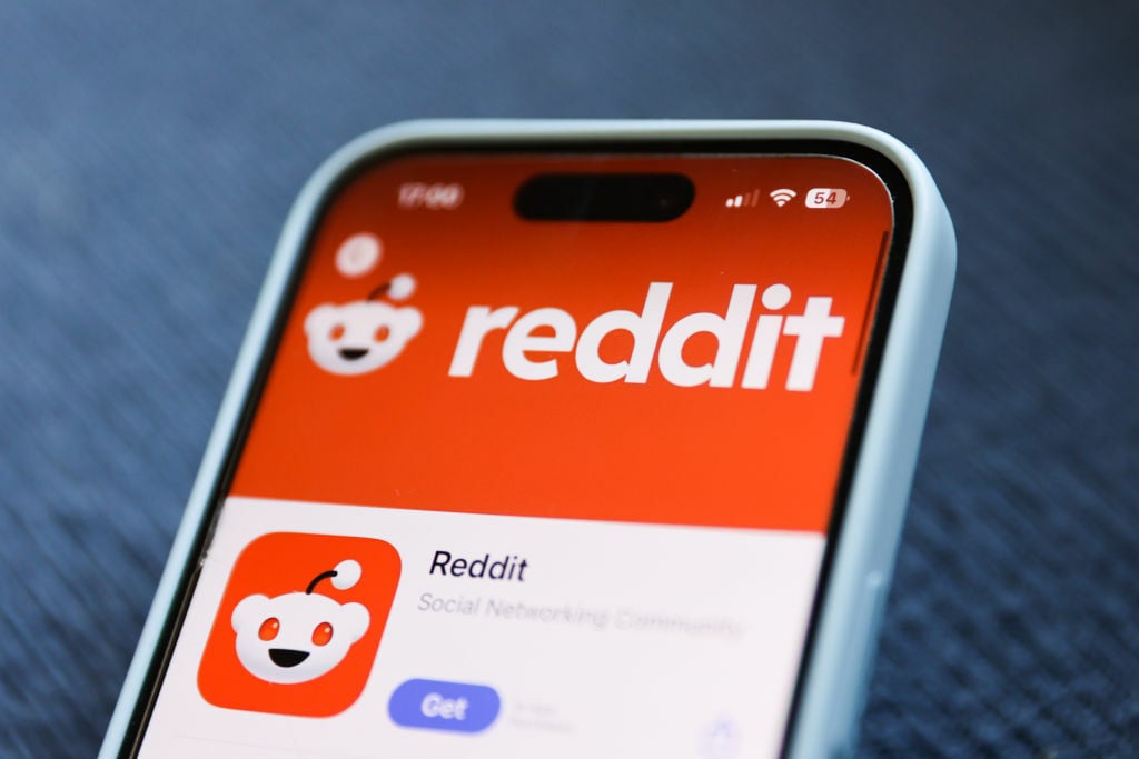 the reddit app on the screen of a smartphone