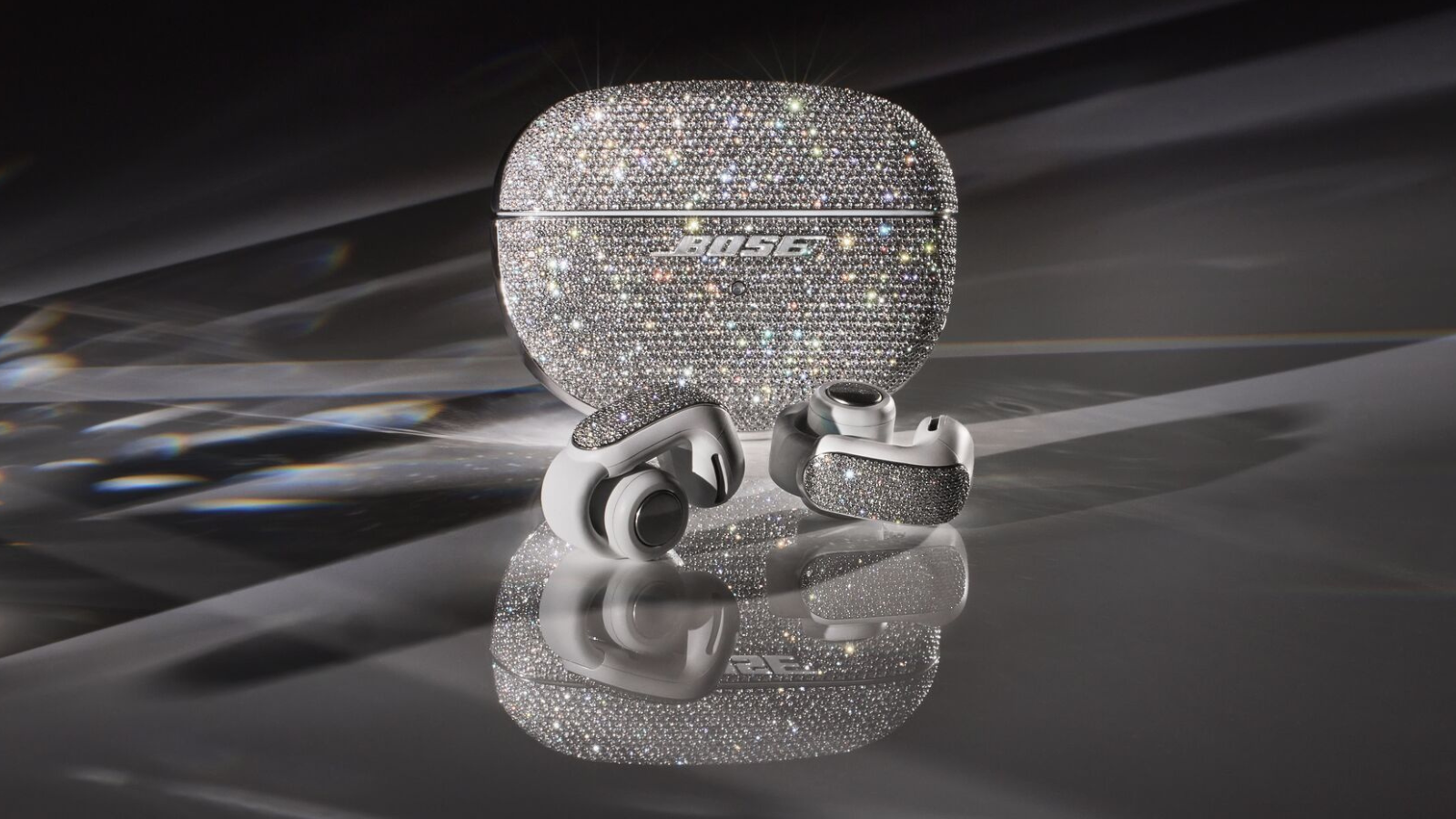 A pair of diamond-encrusted Bose Ultra Open Earbuds