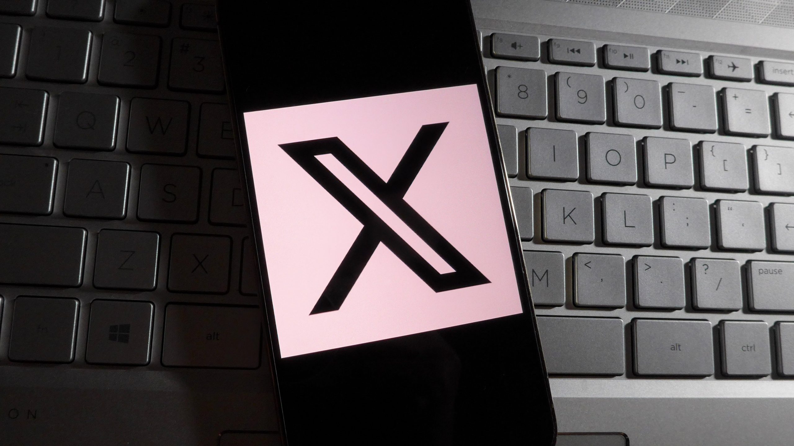 X logo on mobile device