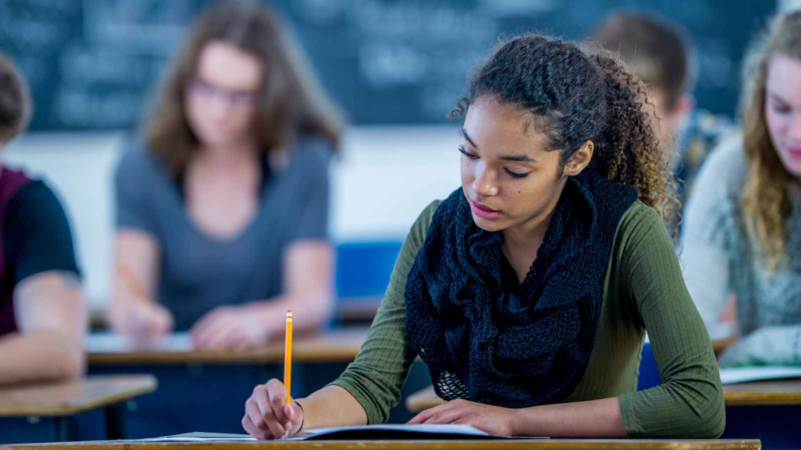 Writing An Exam - stock photo