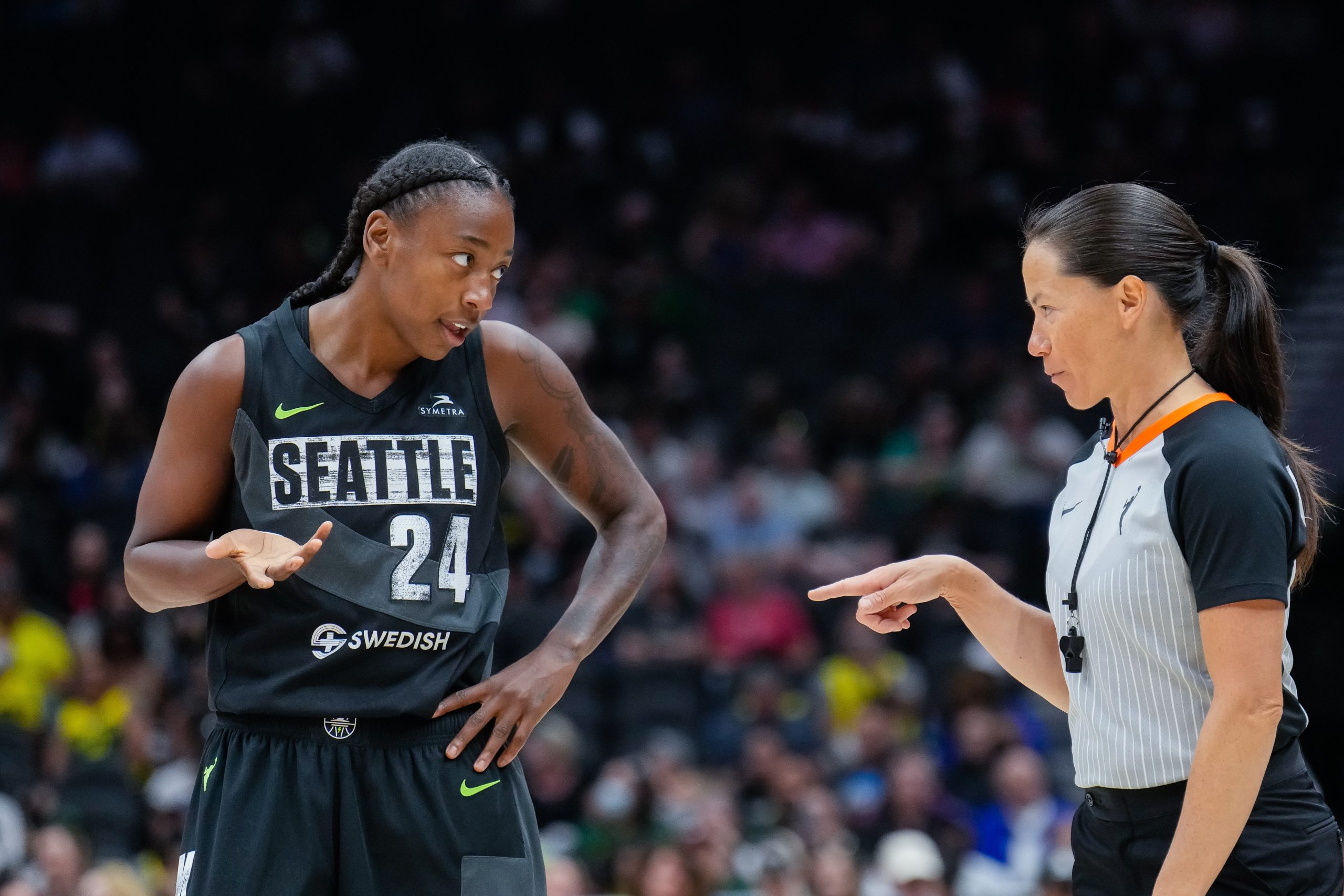 Jewell Loyd of the Seattle Storm talks with a referee 