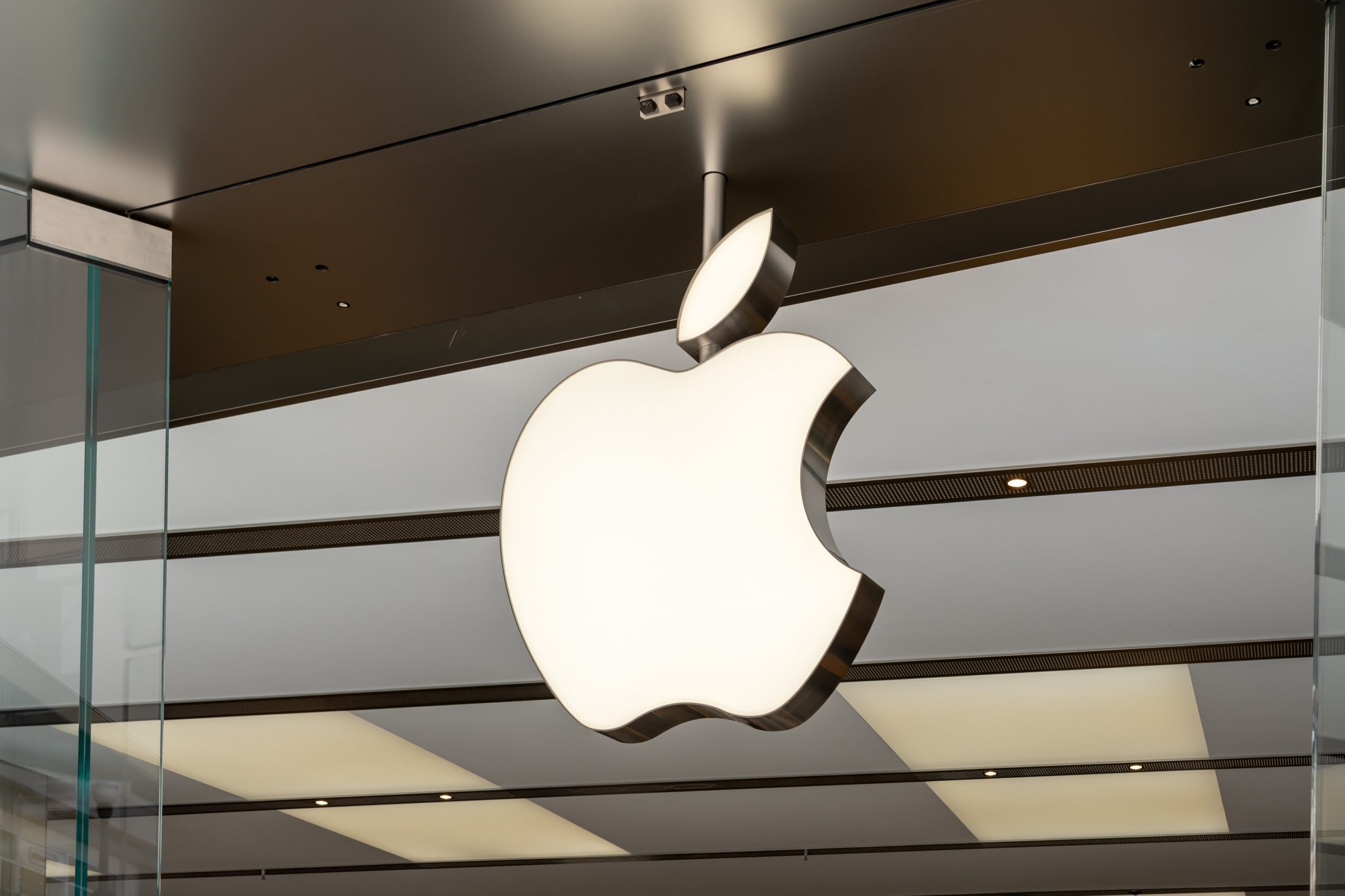 Close up of the apple store logo on a glass window