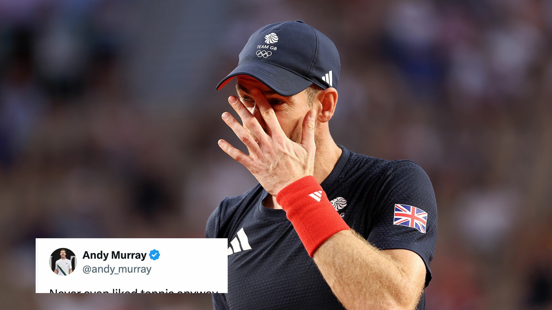 A tennis player holds his hand to his face in obvious emotion. 