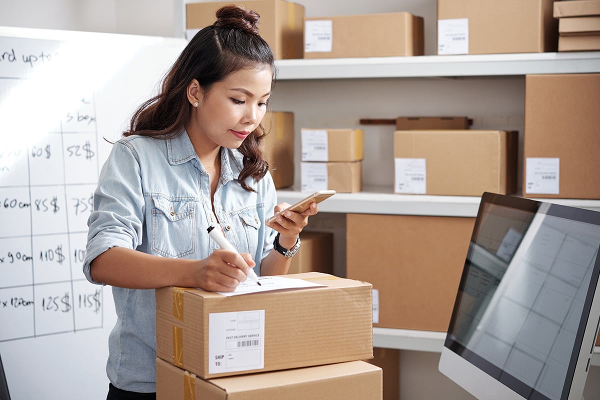 Women packing boxes