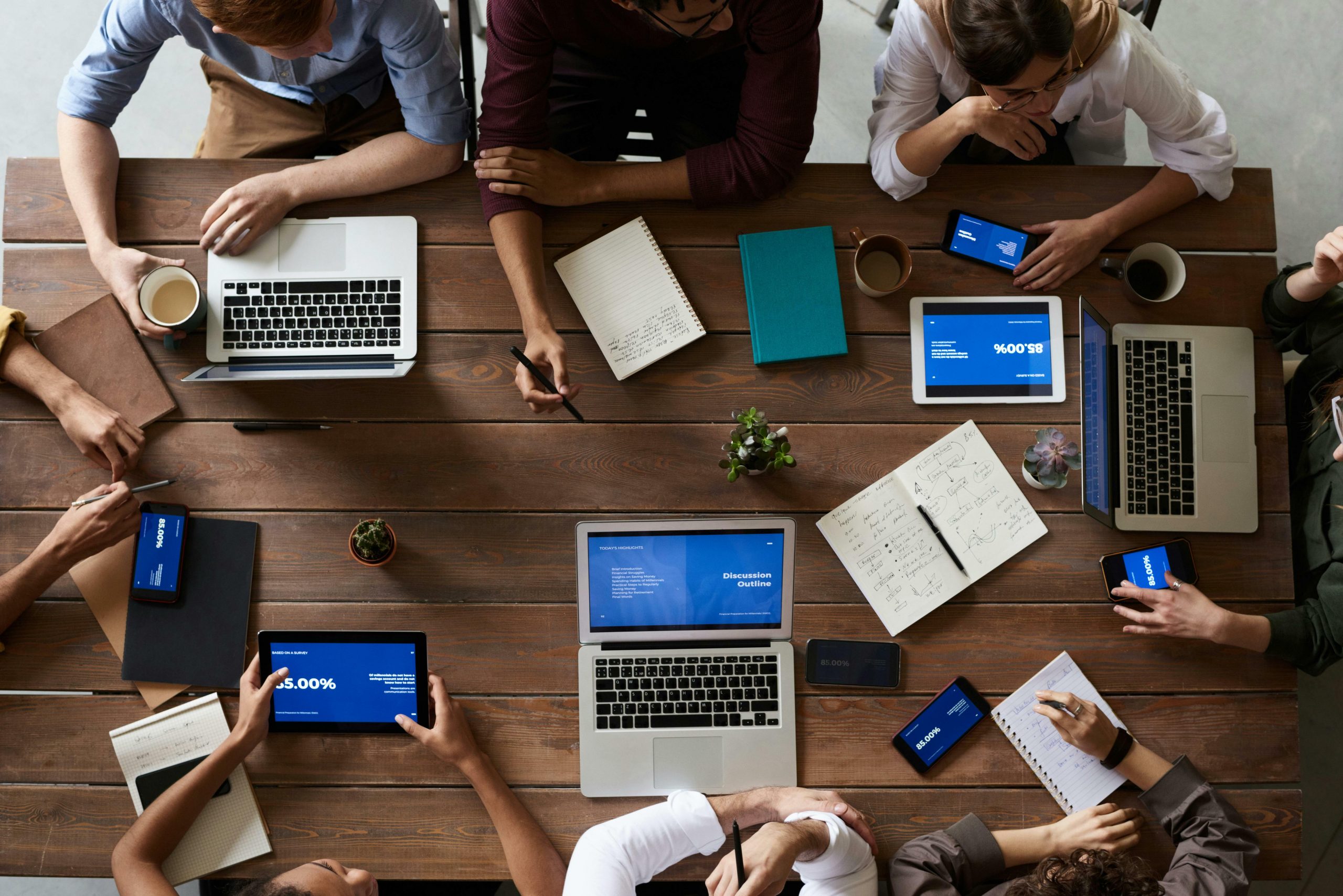 People working around a table.