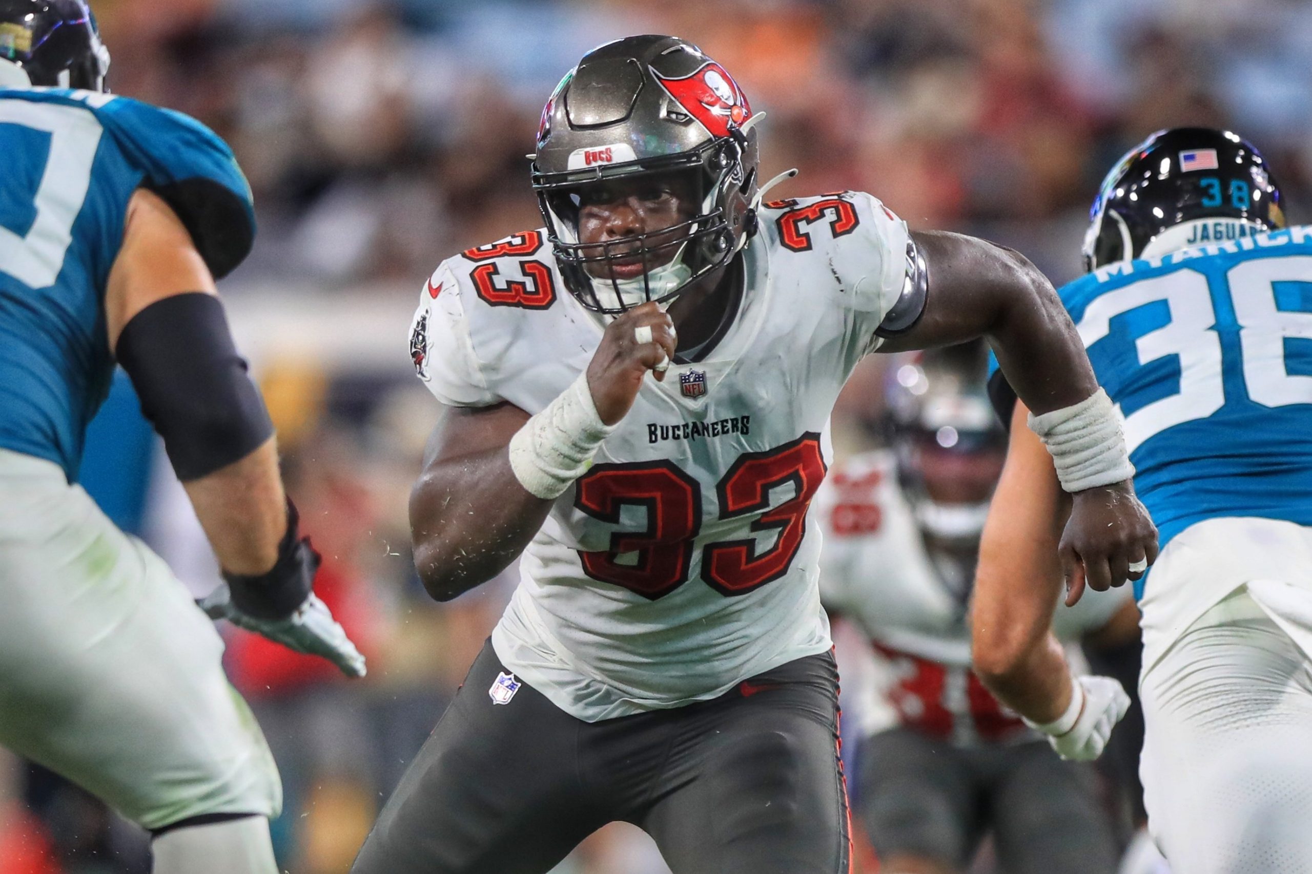 Tampa Bay Buccaneers Linebacker Jose Ramirez rushes a passer 