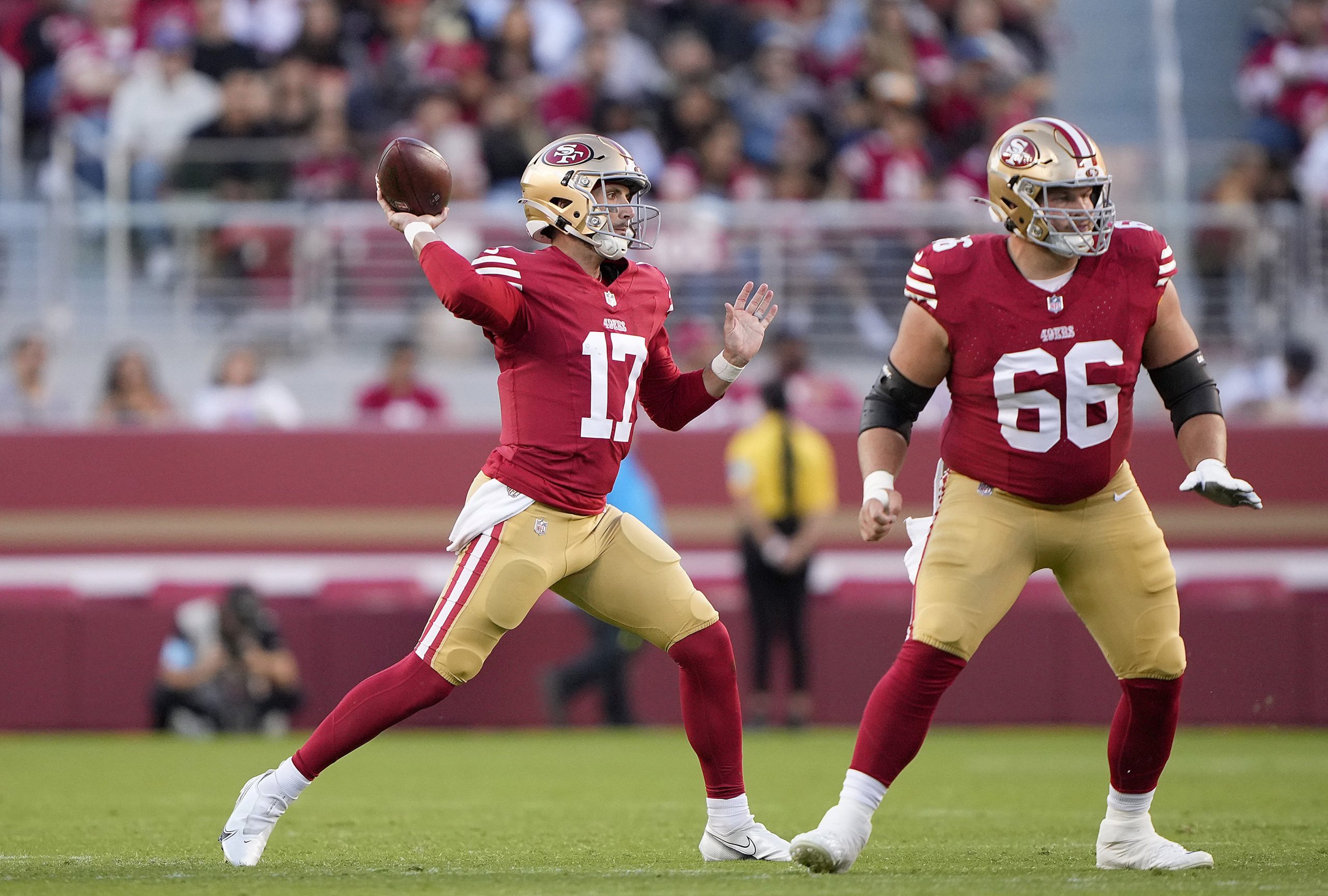 Brandon Allen of the San Francisco 49ers throws a pass 