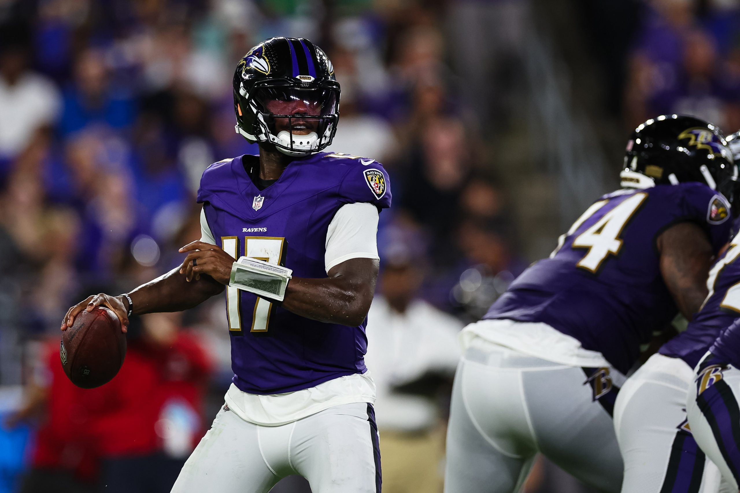 Josh Johnson of the Baltimore Ravens looks to pass