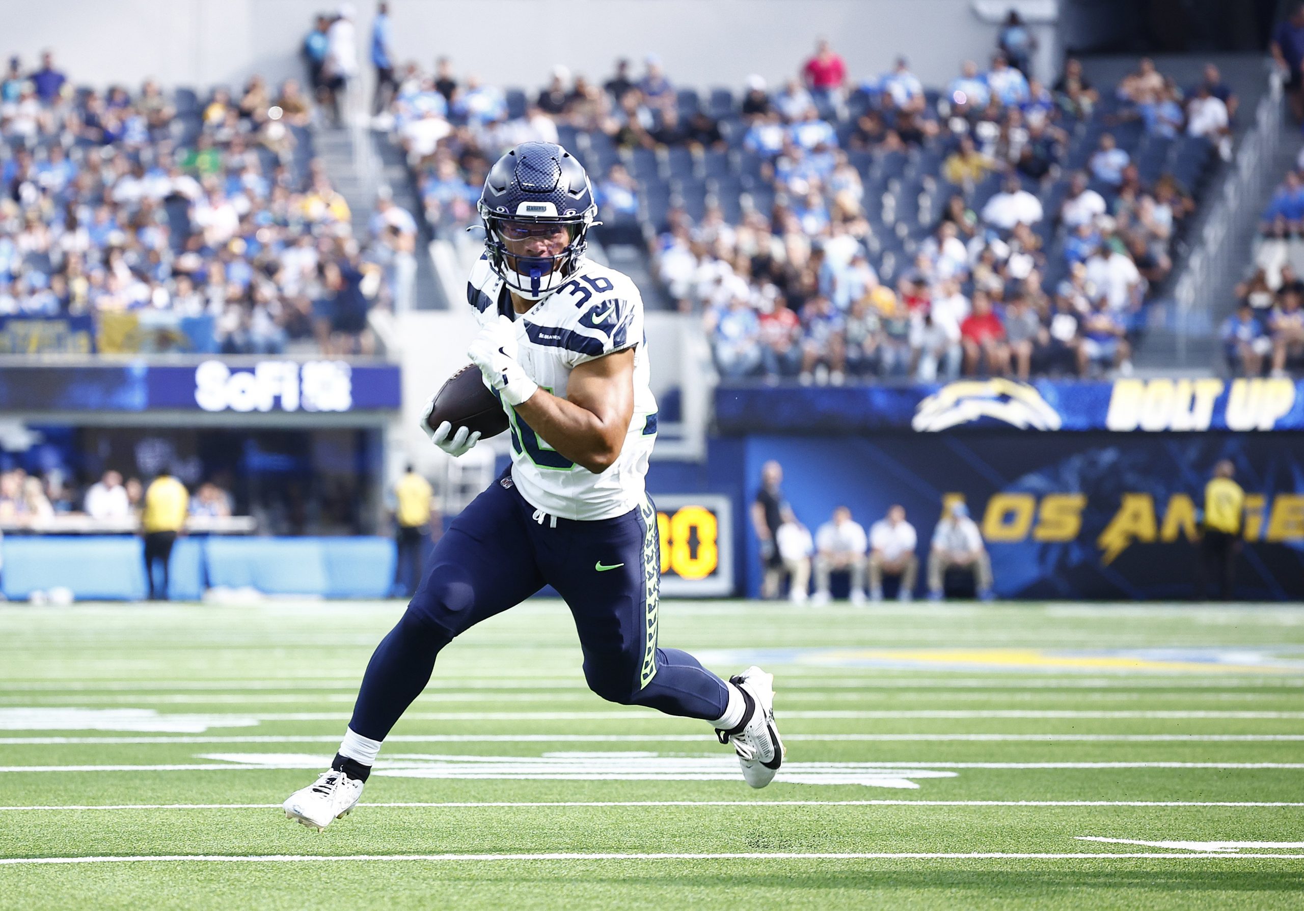 George Holani of the Seattle Seahawks scores a touchdown