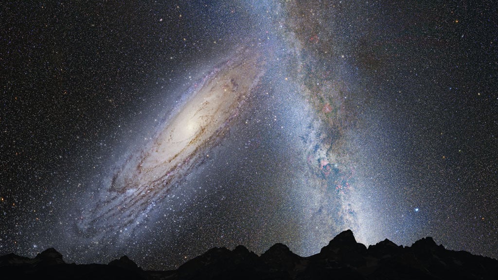 A hypothetical view from Earth as the Andromeda galaxy (on left) is about to collide with part of the Milky Way galaxy. 