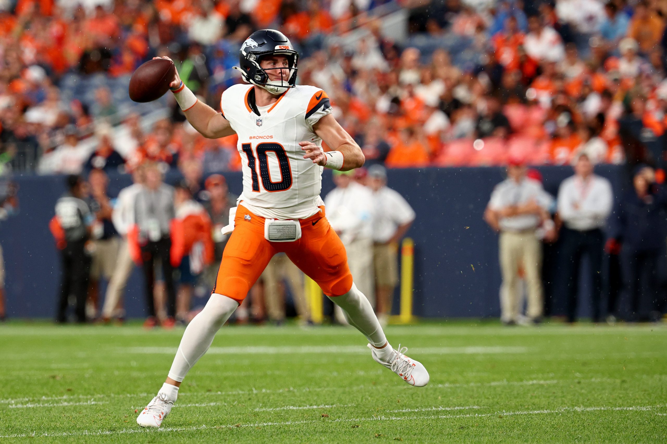 Bo Nix makes a pass for the Broncos