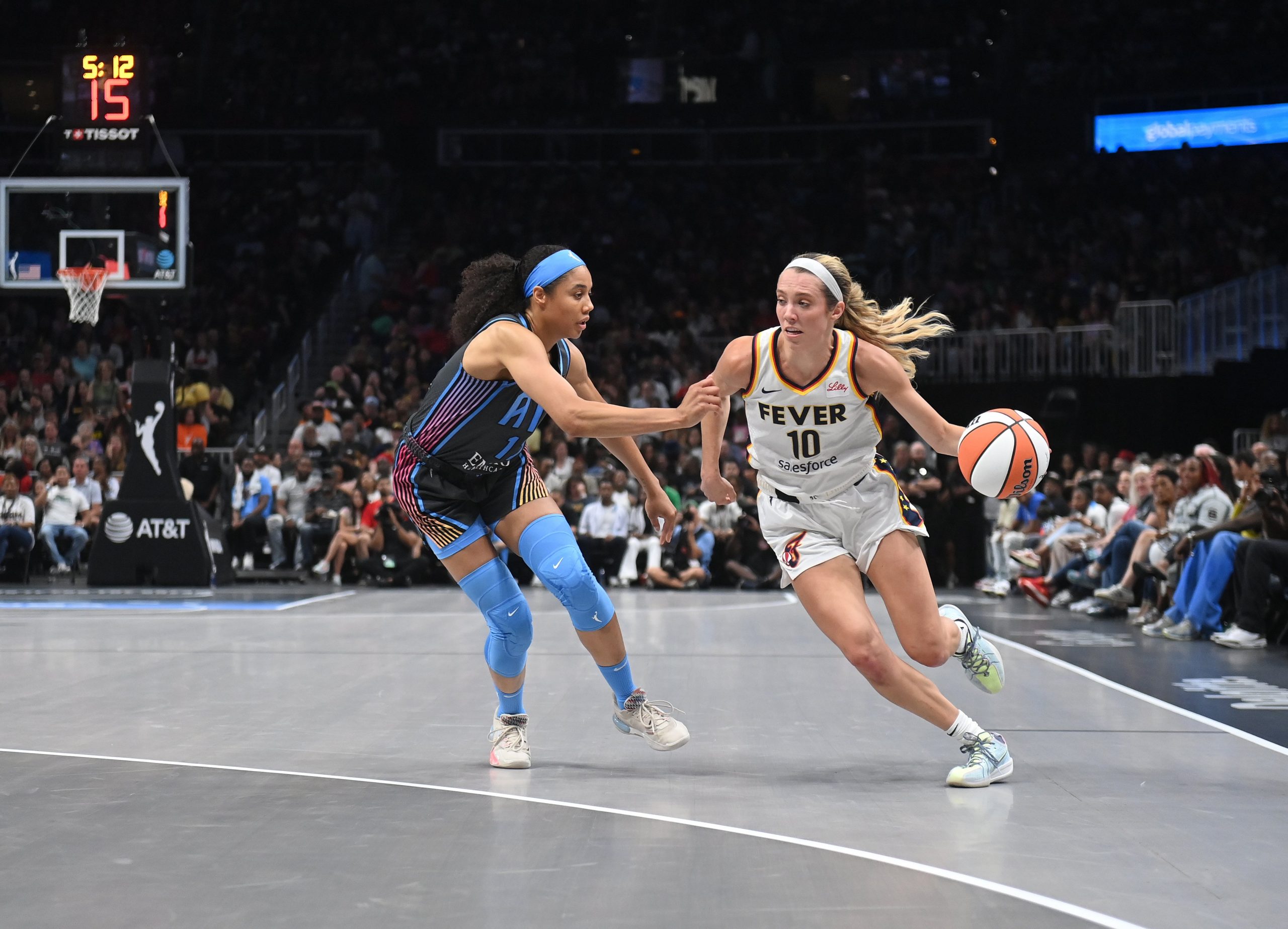 Lexie Hull #10 of the Indiana Fever drives to the basket 