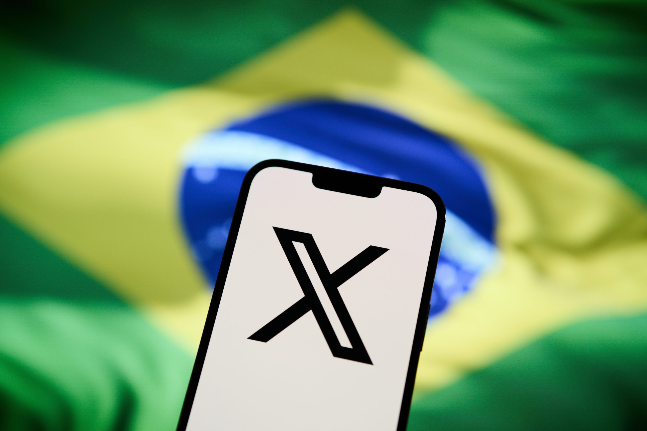 X logo and Brazil flag