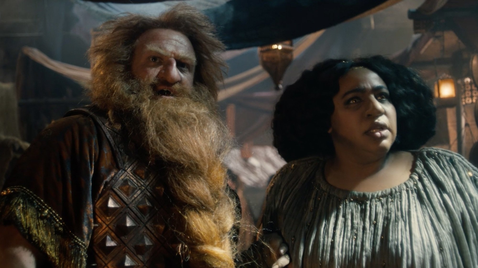 Prince Durin IV and Princess Disa stand in a Khazad-dûm marketplace, looking worried.