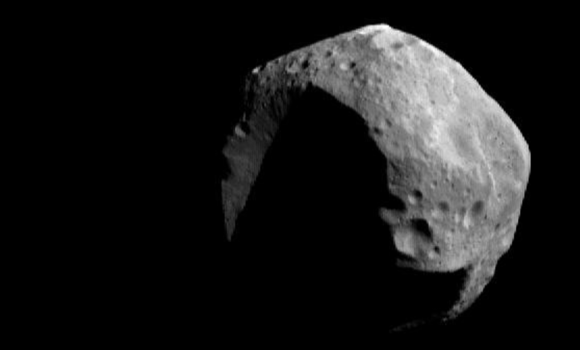 The C-type asteroid Mathilde as captured by the NEAR spacecraft on June 27, 1997. It's some 38 miles (61 kilometers) across.