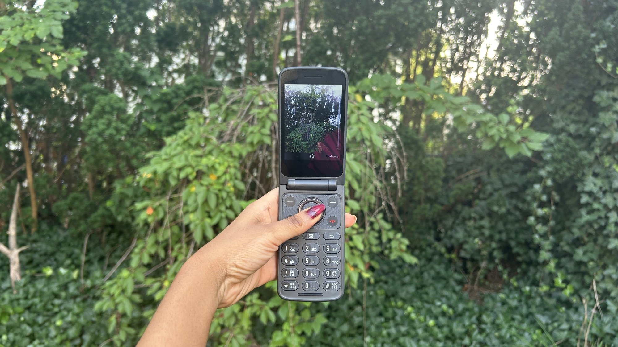 Woman holding TCL Flip 3