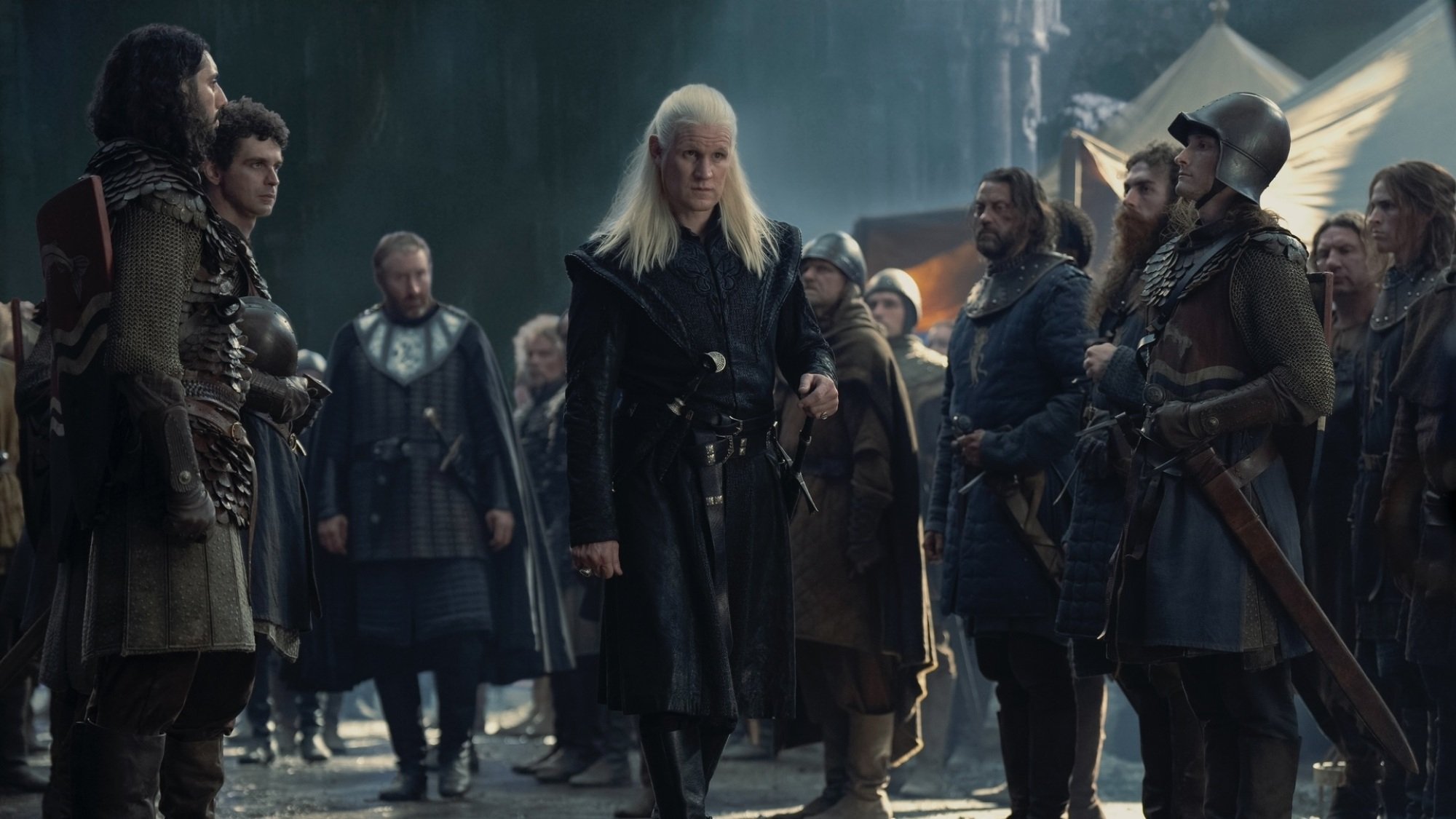 Daemon Targaryen walks through an army of men in Harrenhal.