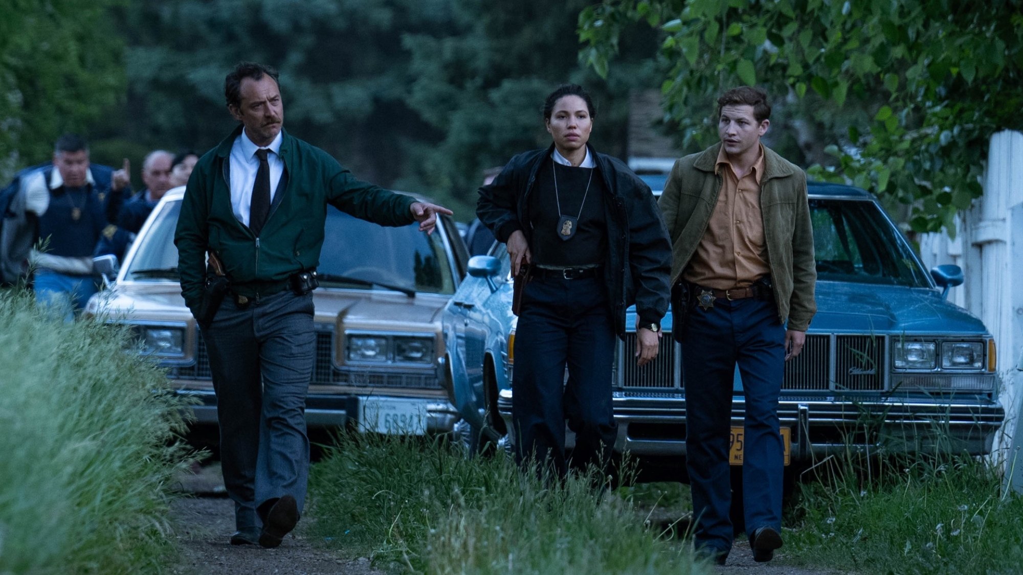 Jude Law, Jurnee Smollett, and Tye Sheridan in "The Order."